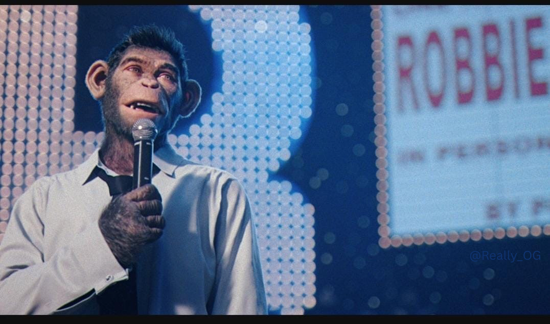 Just caught a glimpse of the new Robbie Williams movie trailer and I'm full of questions