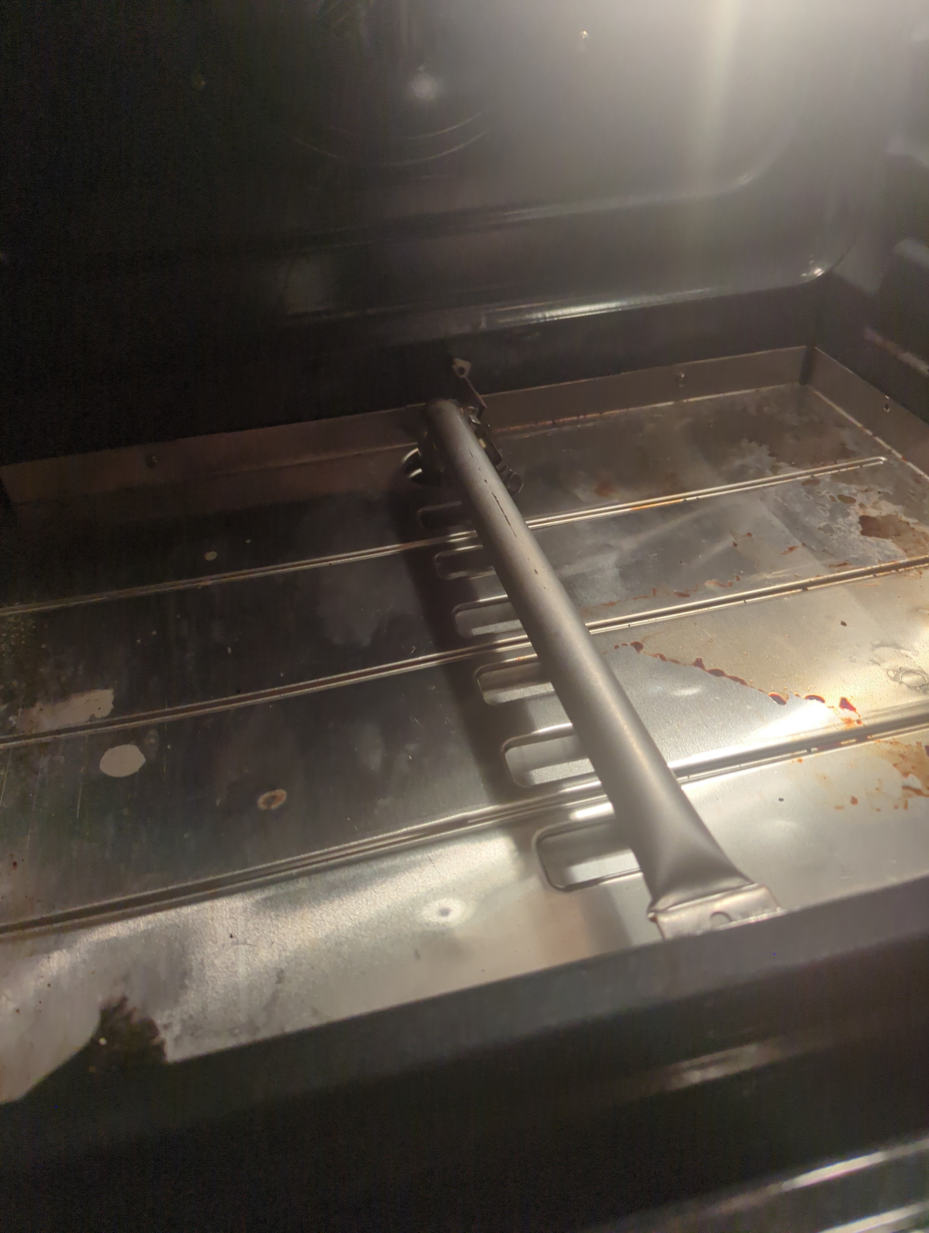 An Old Oven and Its Trusty Ignitor: A Nostalgic Pair