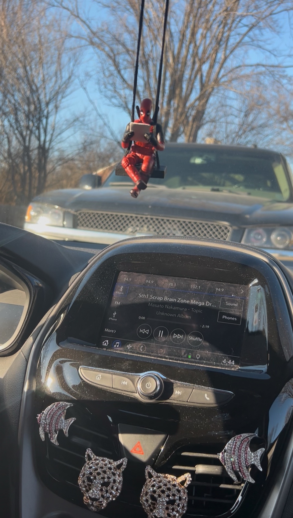 Deadpool Enjoys a Swing While Reading the Newspaper!