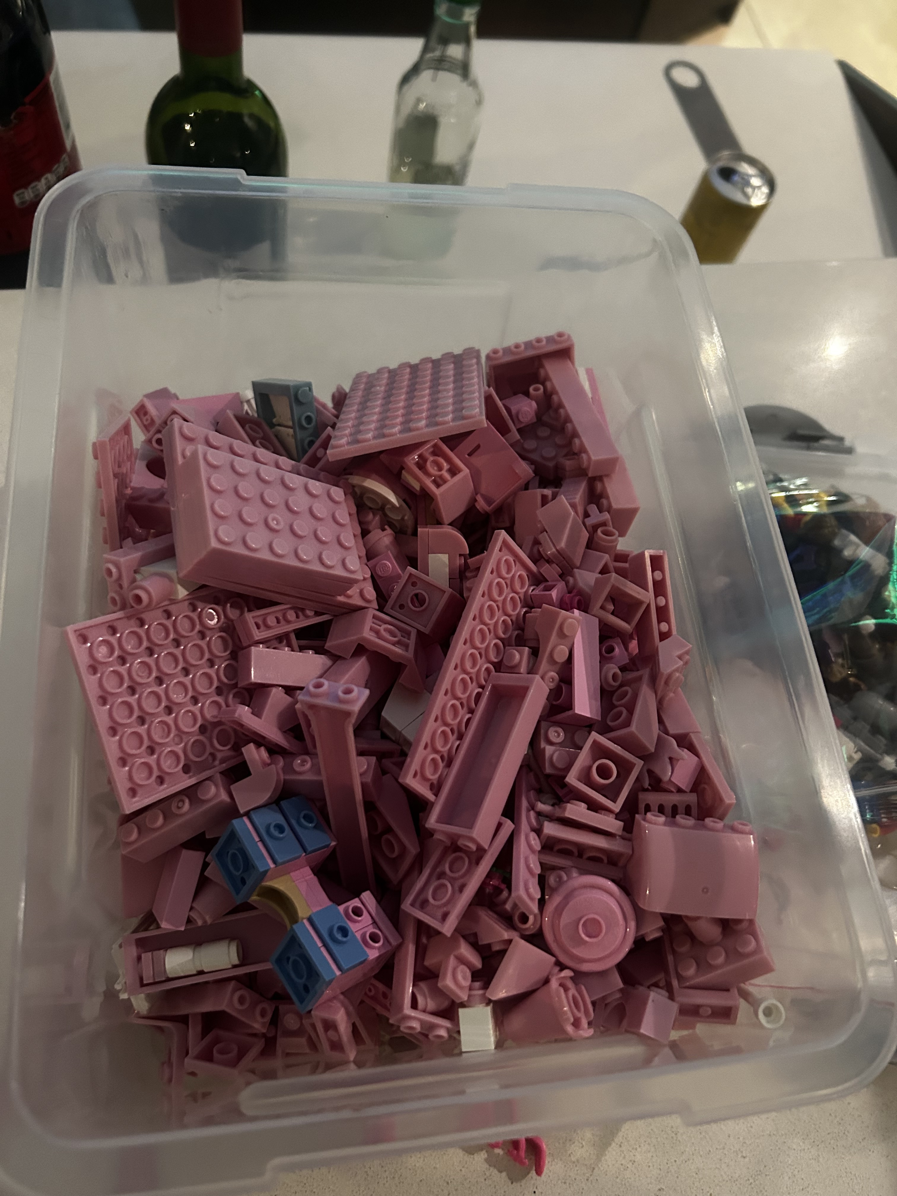 Can You Identify This LEGO Set? A Box of Colorful Pieces Awaits!