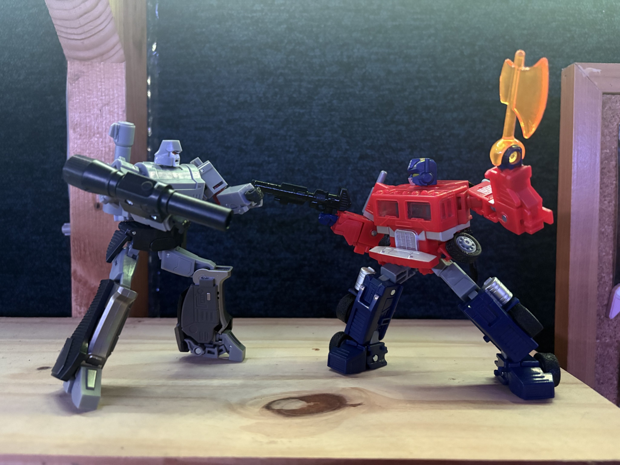 Iconic Duo: Legacy G1 Optimus Prime Meets Deformation Megatron