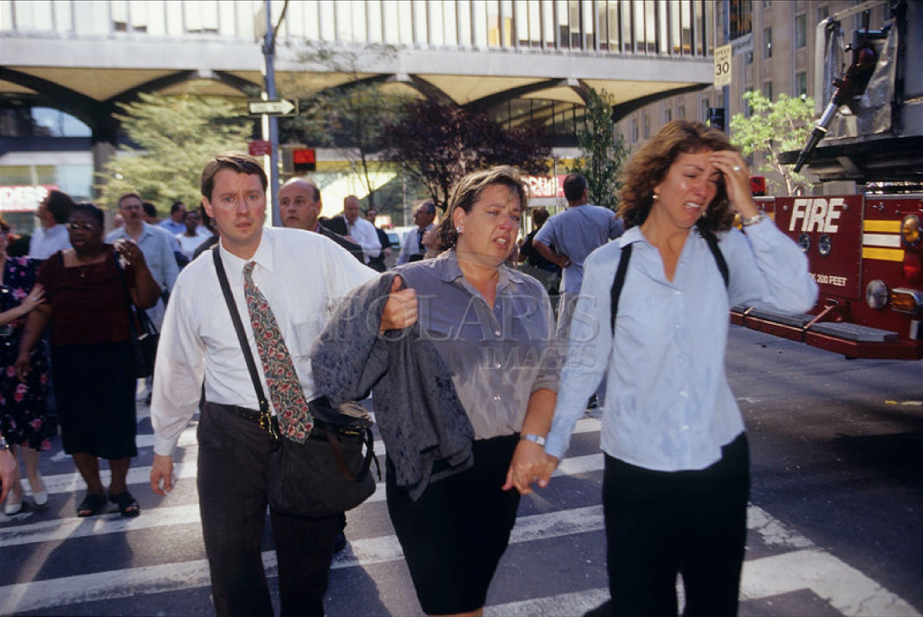 Emotional Faces of Survivors Escaping the Towers on 9/11