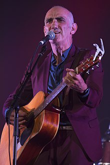Does anyone have the chords for 'All Those Smiling Faces' by Paul Kelly?
