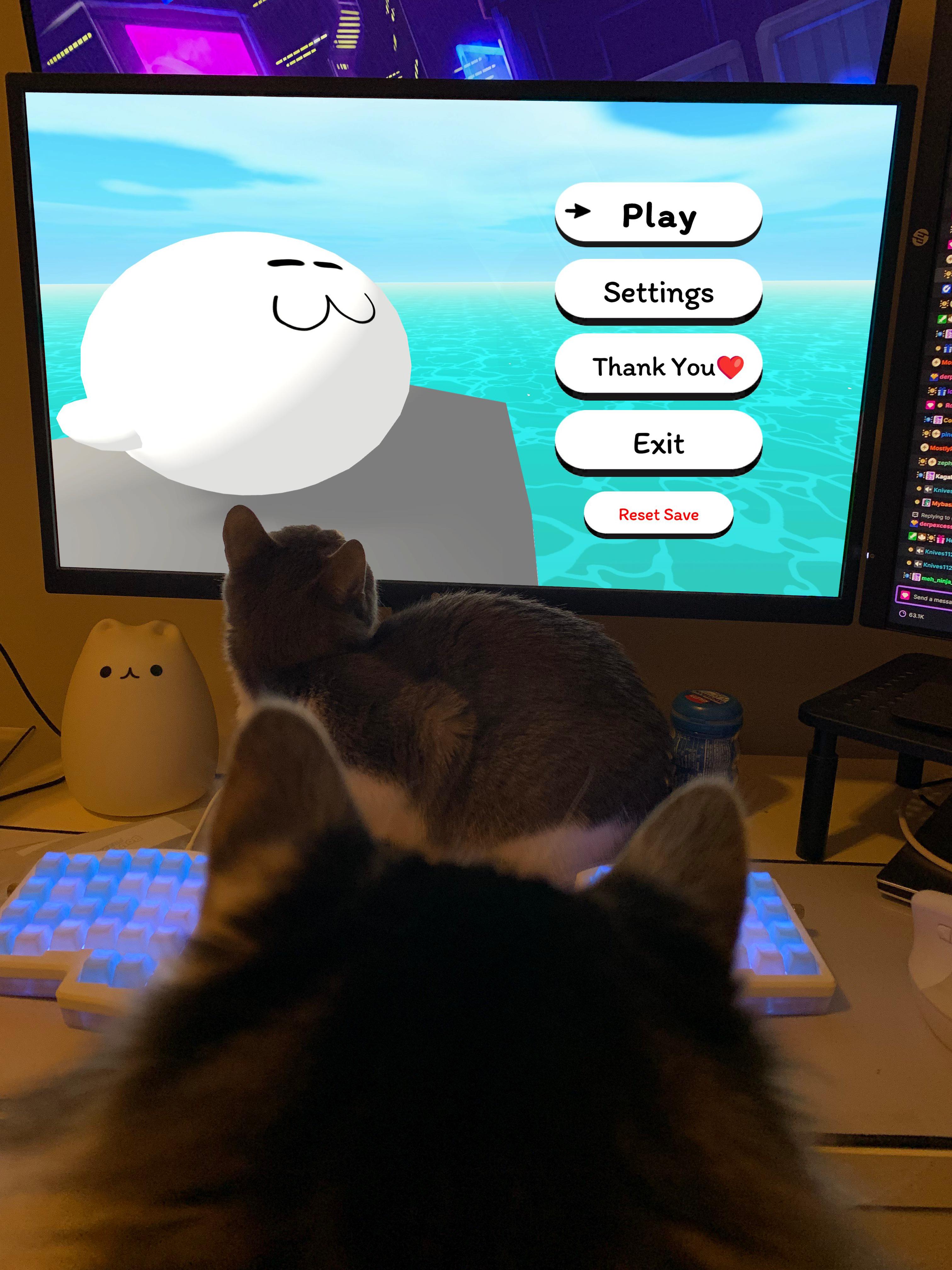 This Christmas, Play Seal World and Watch Your Cat's Reaction!