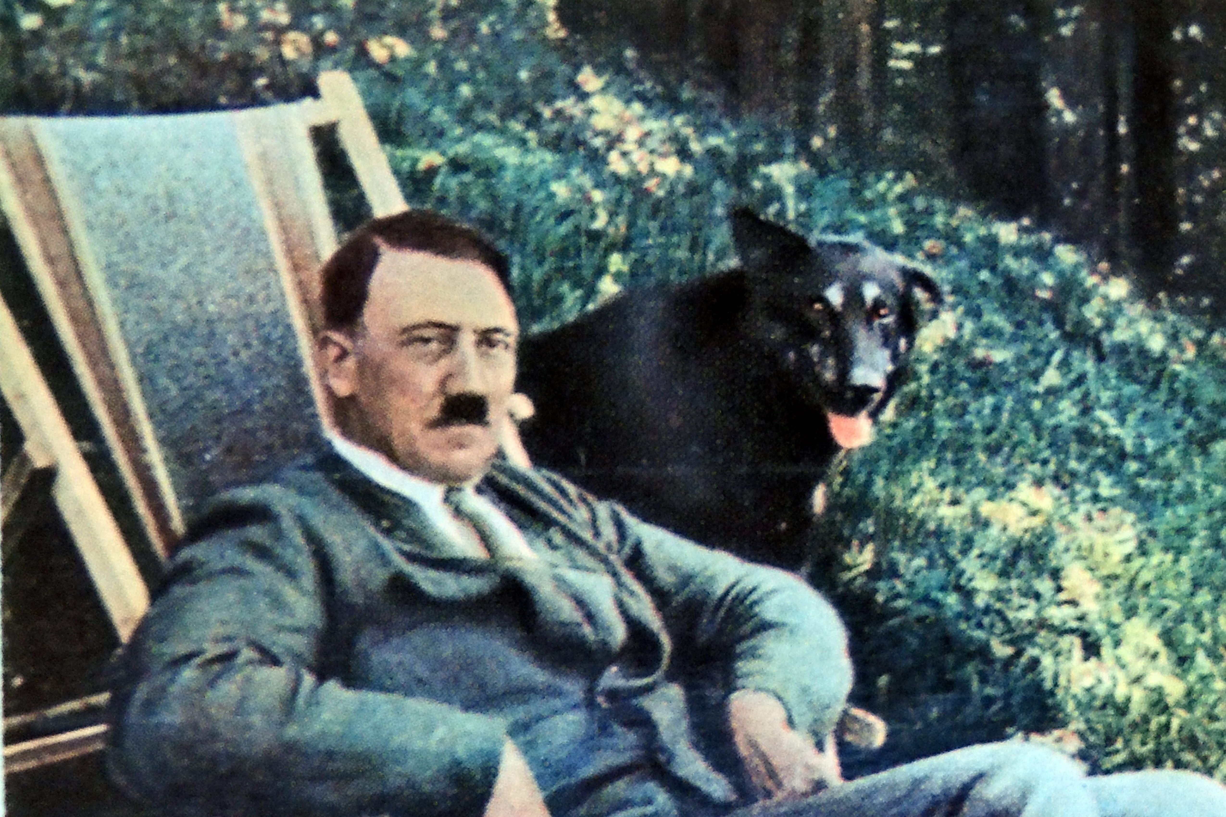 A chilling image of a Nazi and his loyal companion.