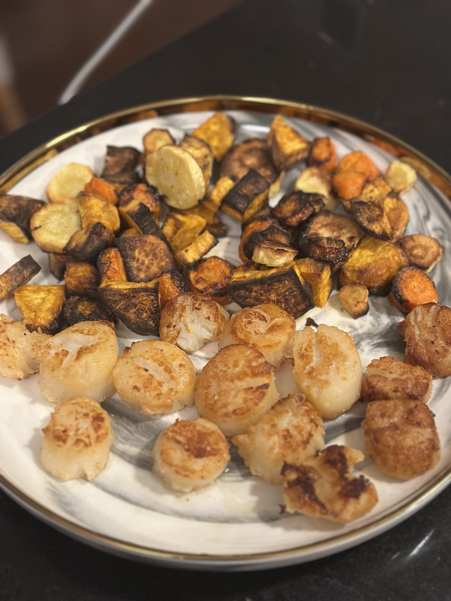 Delicious scallops paired with root vegetables!