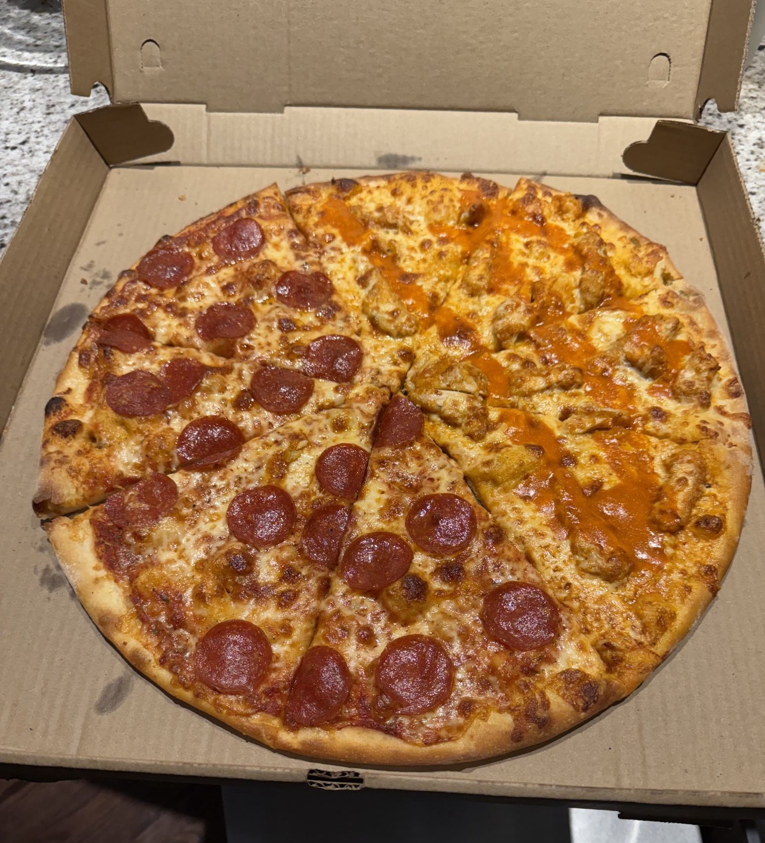 Pizza Perfection: Half Pepperoni, Half Buffalo Chicken