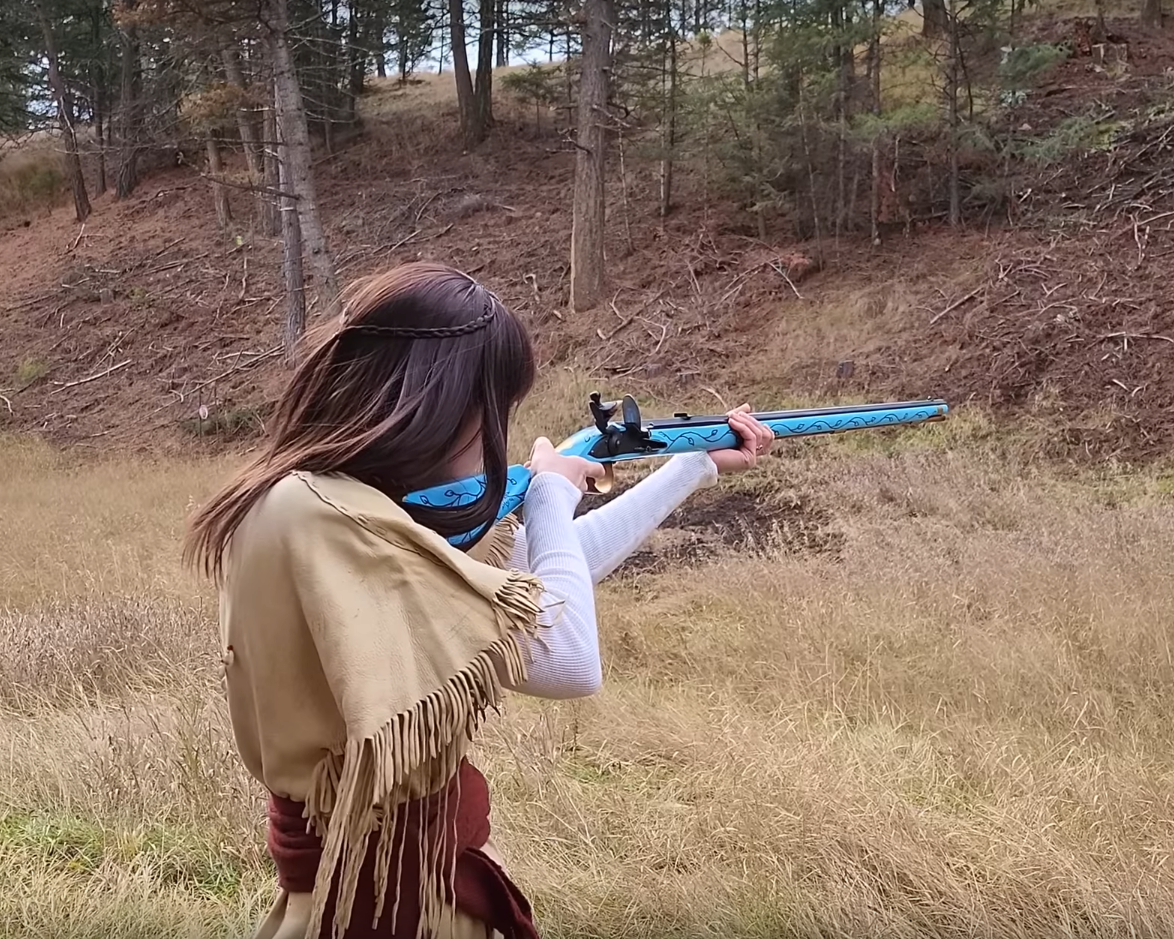 A Native American trade flintlock, beautifully painted blue