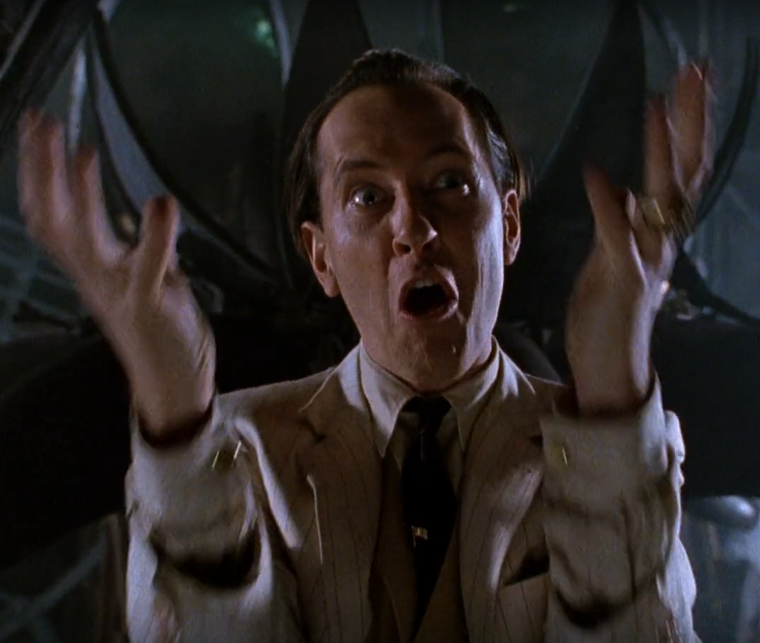 Elmo gives off serious Darwin Mayflower vibes from Hudson Hawk