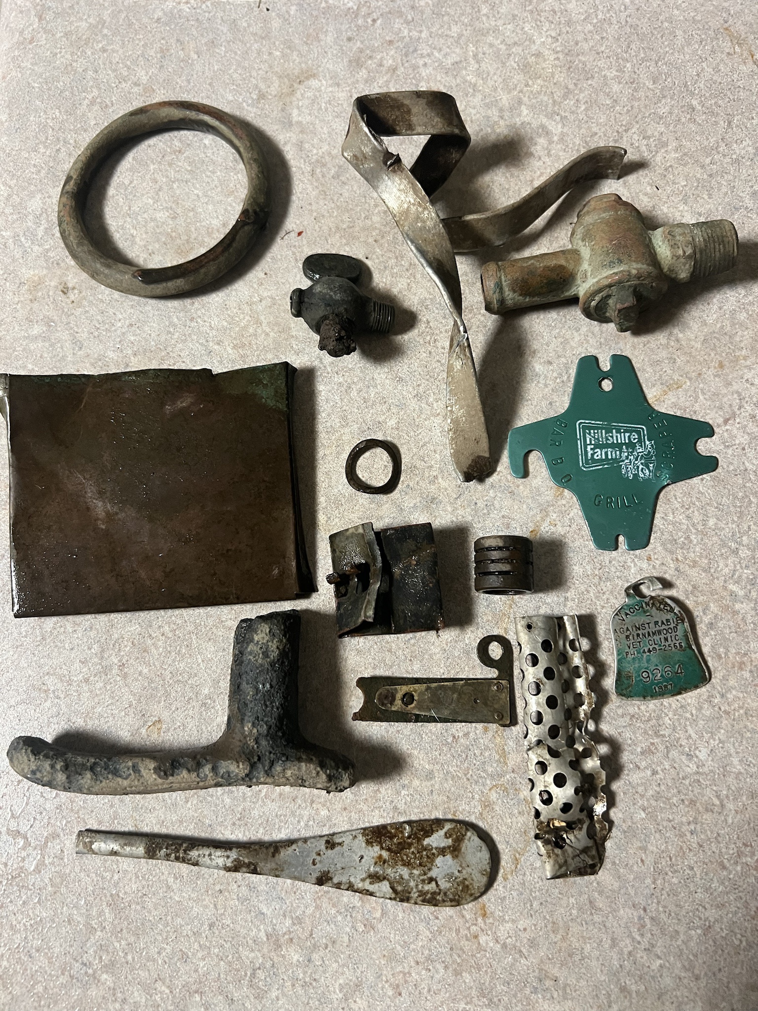 What an Amazing Day of Treasure Hunting! Unearthed a Silver Merc, a Spoon, a Beautiful Pendant, Vintage Makeup Compacts, a Thermometer, a 1930s Toledo Tomboy Bike Decal, and Two Stars Honoring Army Veterans.