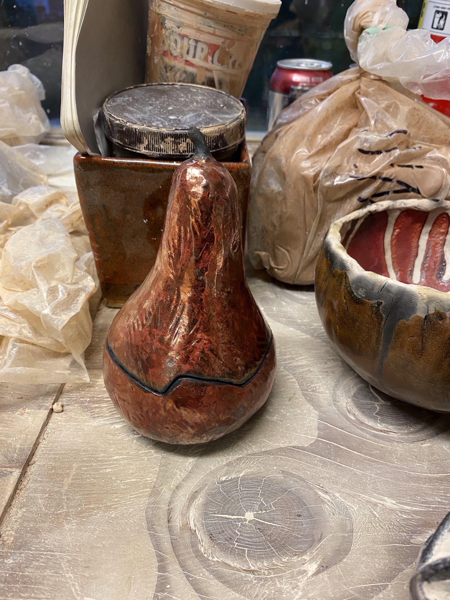 A Gleaming Copper Pear Accompanied by a Charming Snail Bowl or Candle Holder!