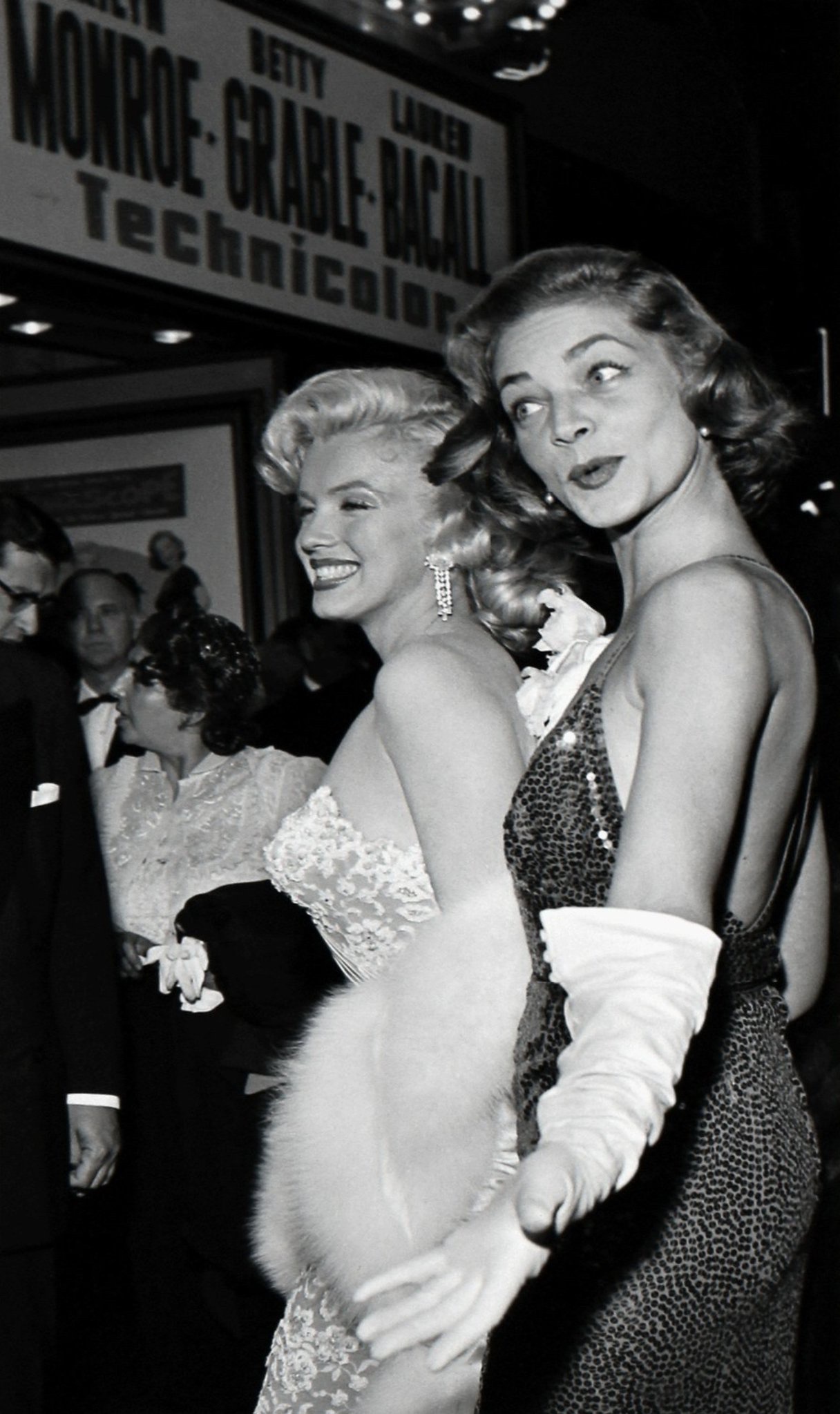 A Glamorous Moment: Marilyn Monroe and Lauren Bacall at the 1953 Premiere of 'How to Marry a Millionaire'