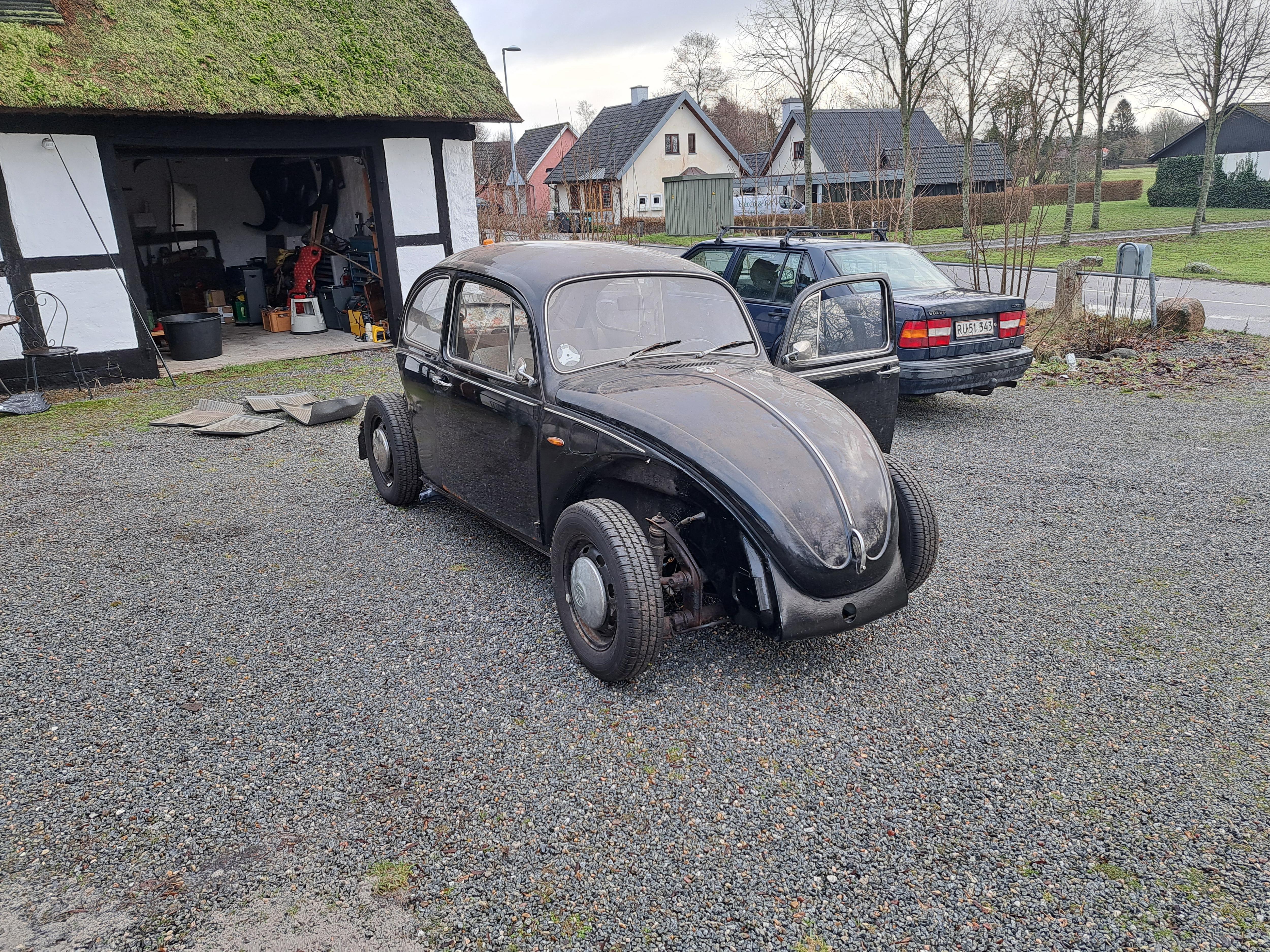 My Beloved 1969 Volkswagen Bug and 1996 Volvo: A Classic Duo
