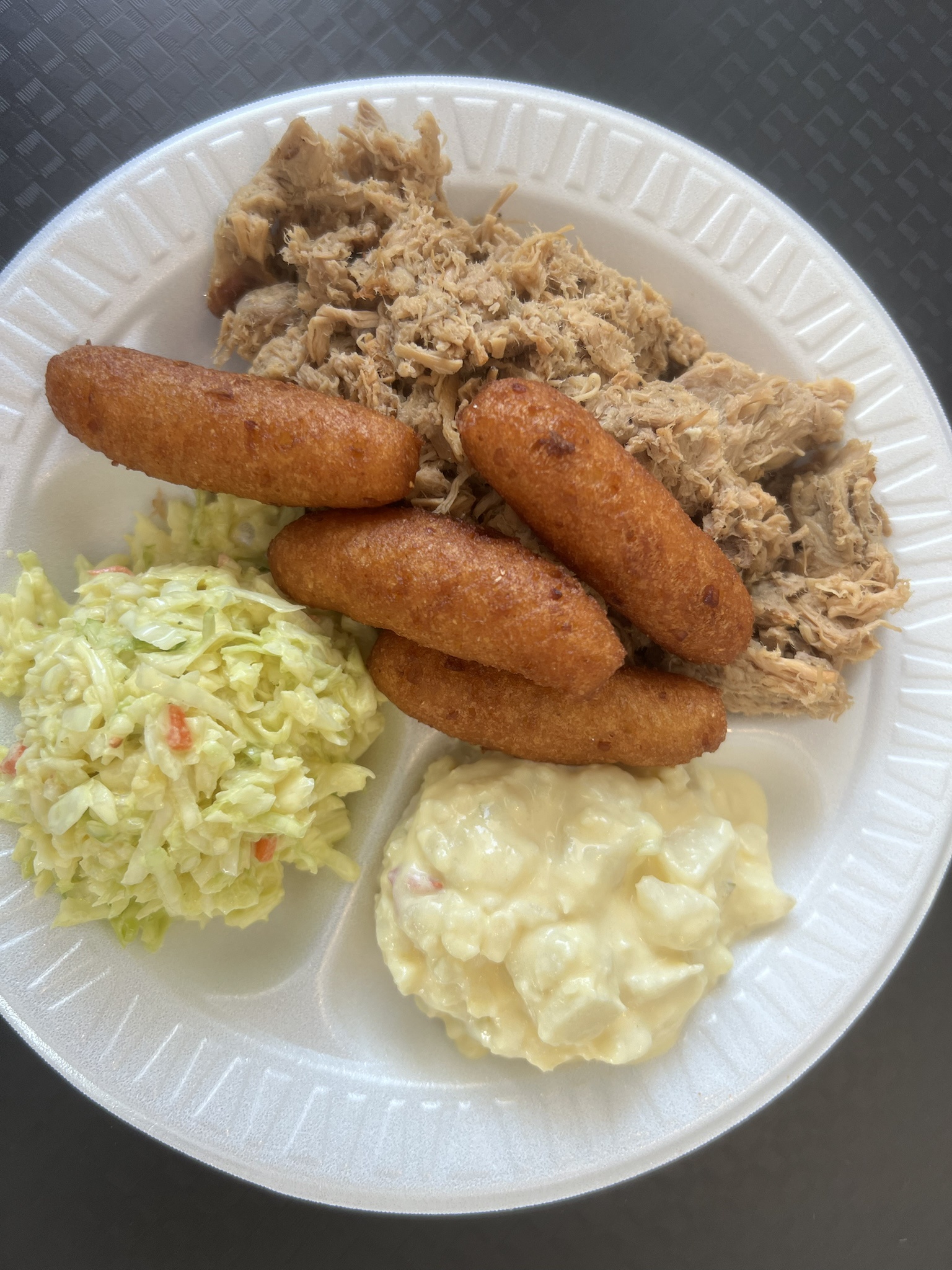 A Southern Feast: NC BBQ with Hushpuppies, Cole Slaw, and Potato Salad