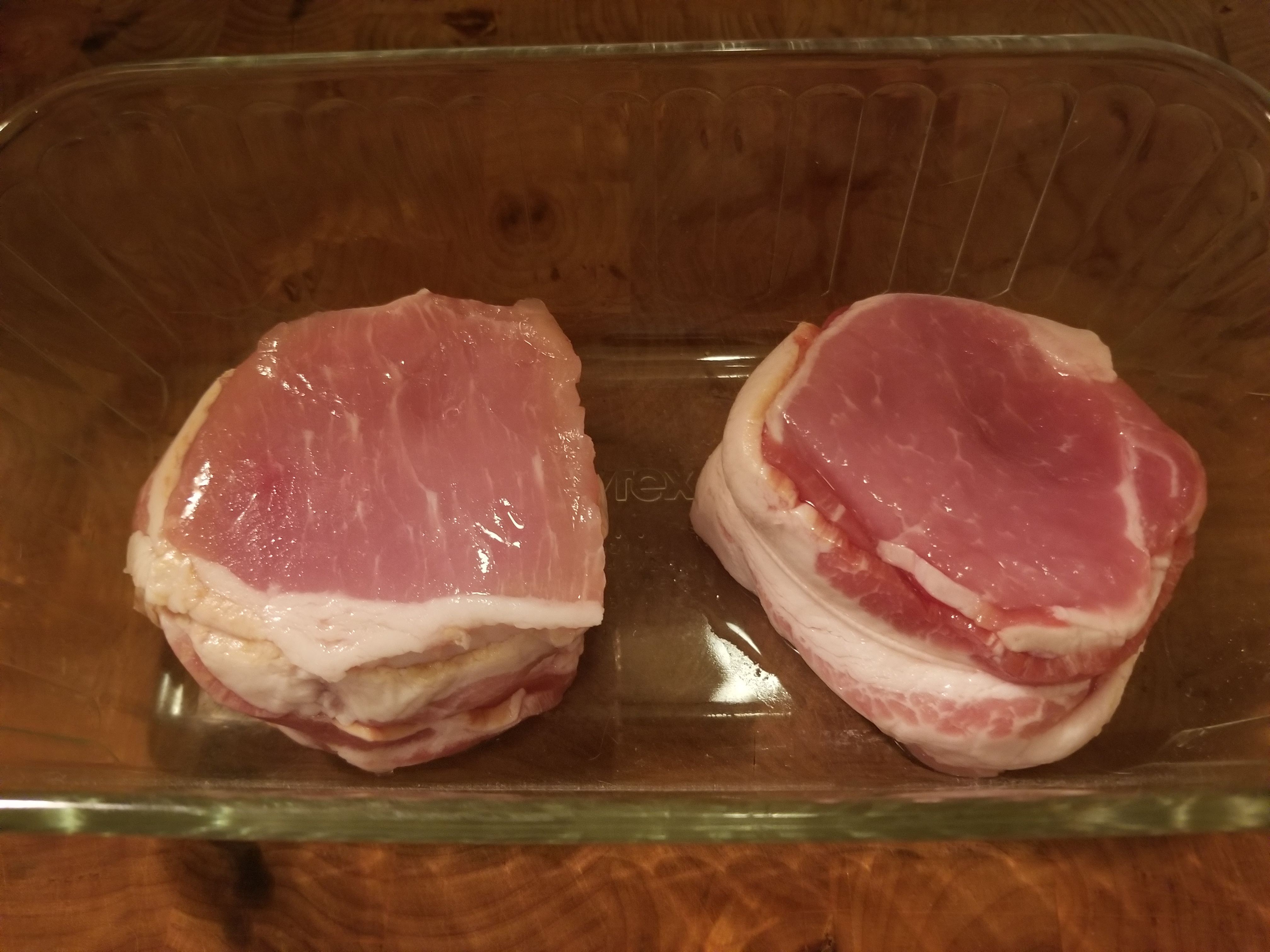 Deliciously Indulgent Bacon-Wrapped Pork Chops with Pear Cabernet Sauce