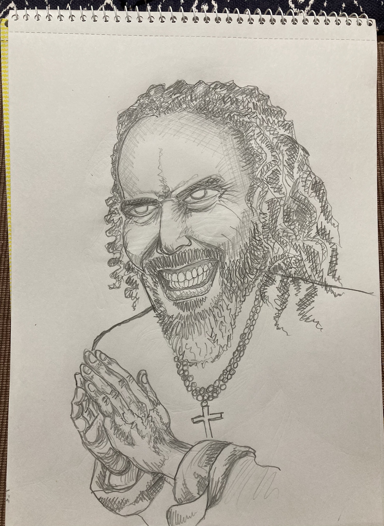 My portrait of Russell Brand realizing the profit in pretending to be Christian while dodging serious allegations.