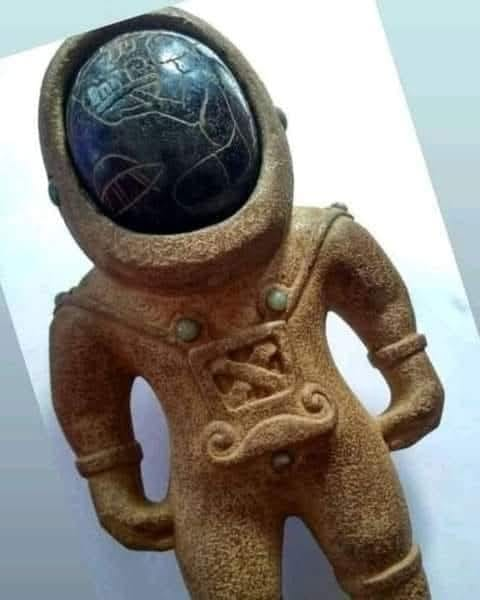 Ah yes, ancient Mesopotamia: where the wealthy flaunted space suits and mustaches of questionable taste.