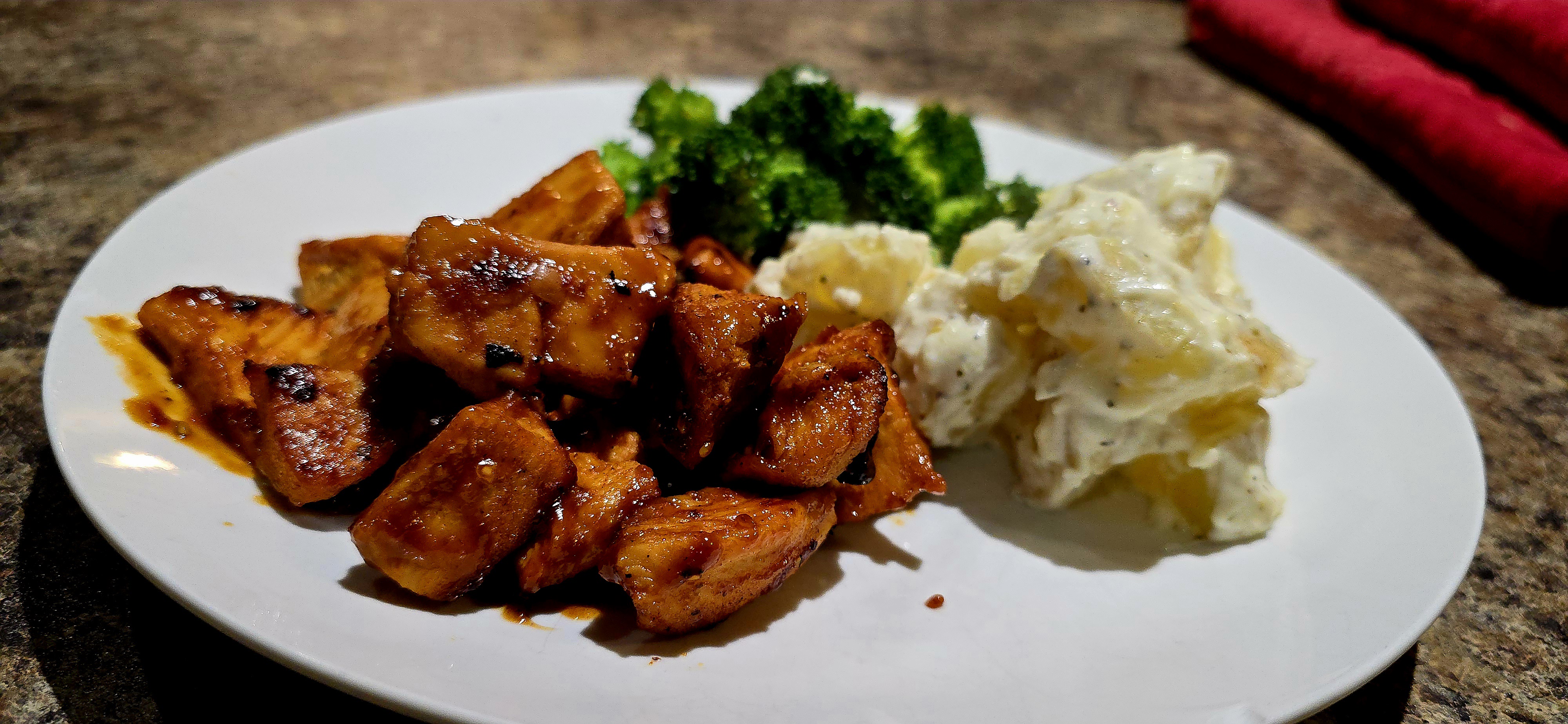 Savoring BBQ Chicken with Creamy Garlic Parmesan Potatoes and Steamed Broccoli