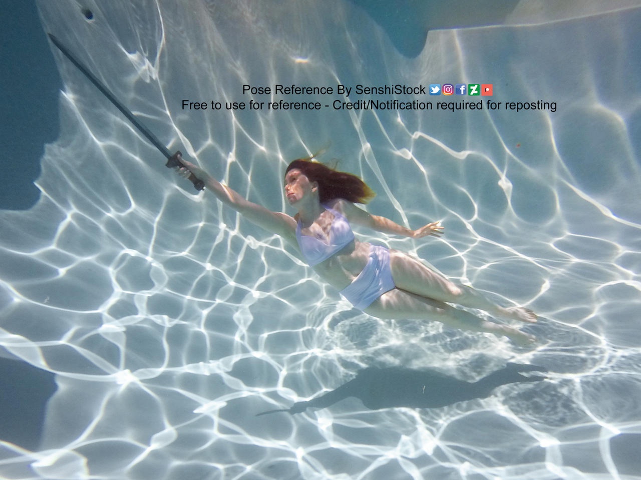 Daily Pose Challenge: Underwater Sword Pose with a Magical Twist