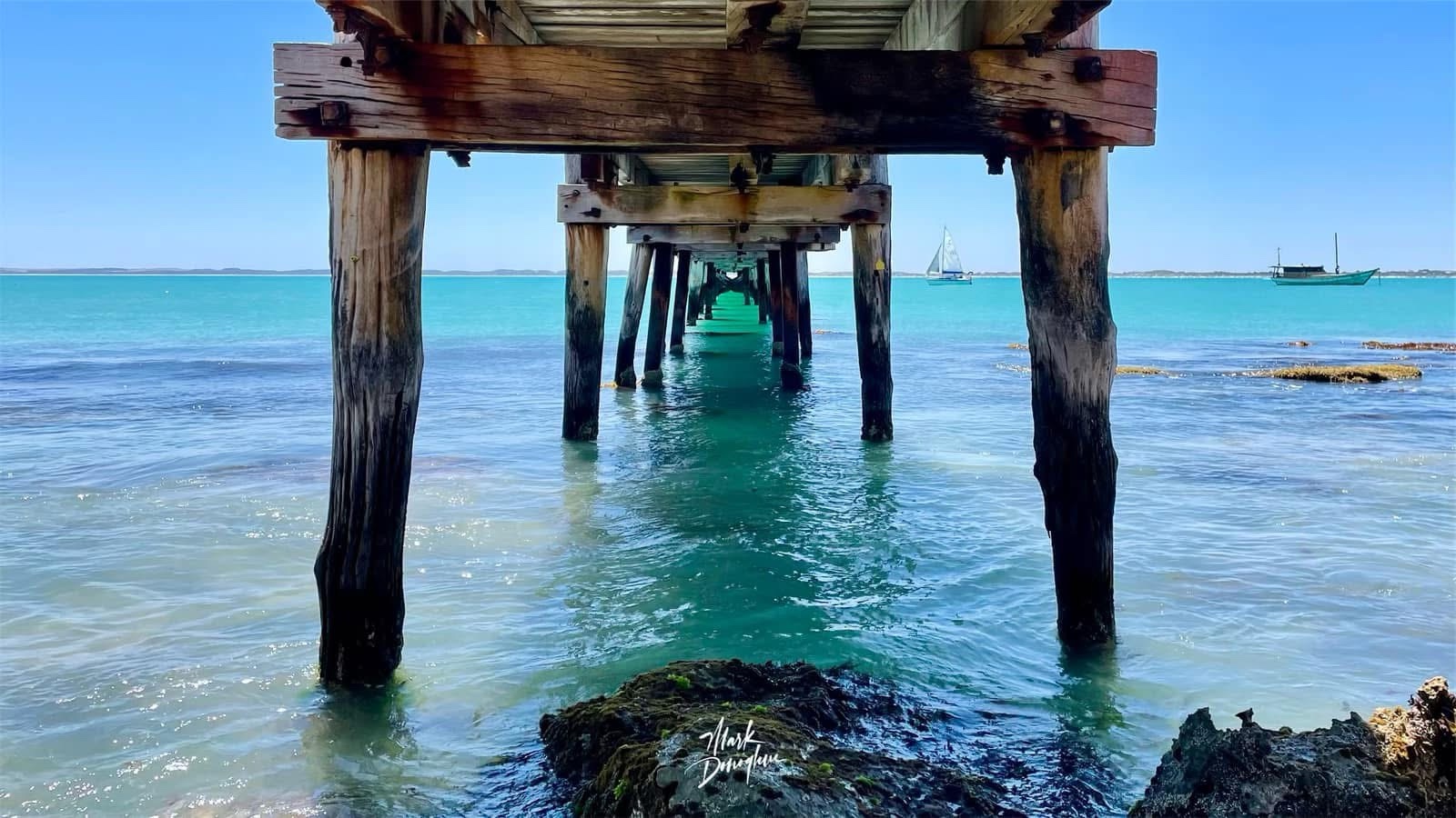 A Serene View Under the Pier