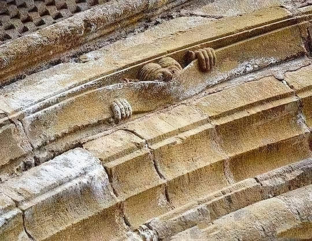 This whimsical carving from the Abbey of Sainte Foy in Conques, France, circa 1050 AD, showcases the playful spirit of a medieval mason with its charming stone figure.