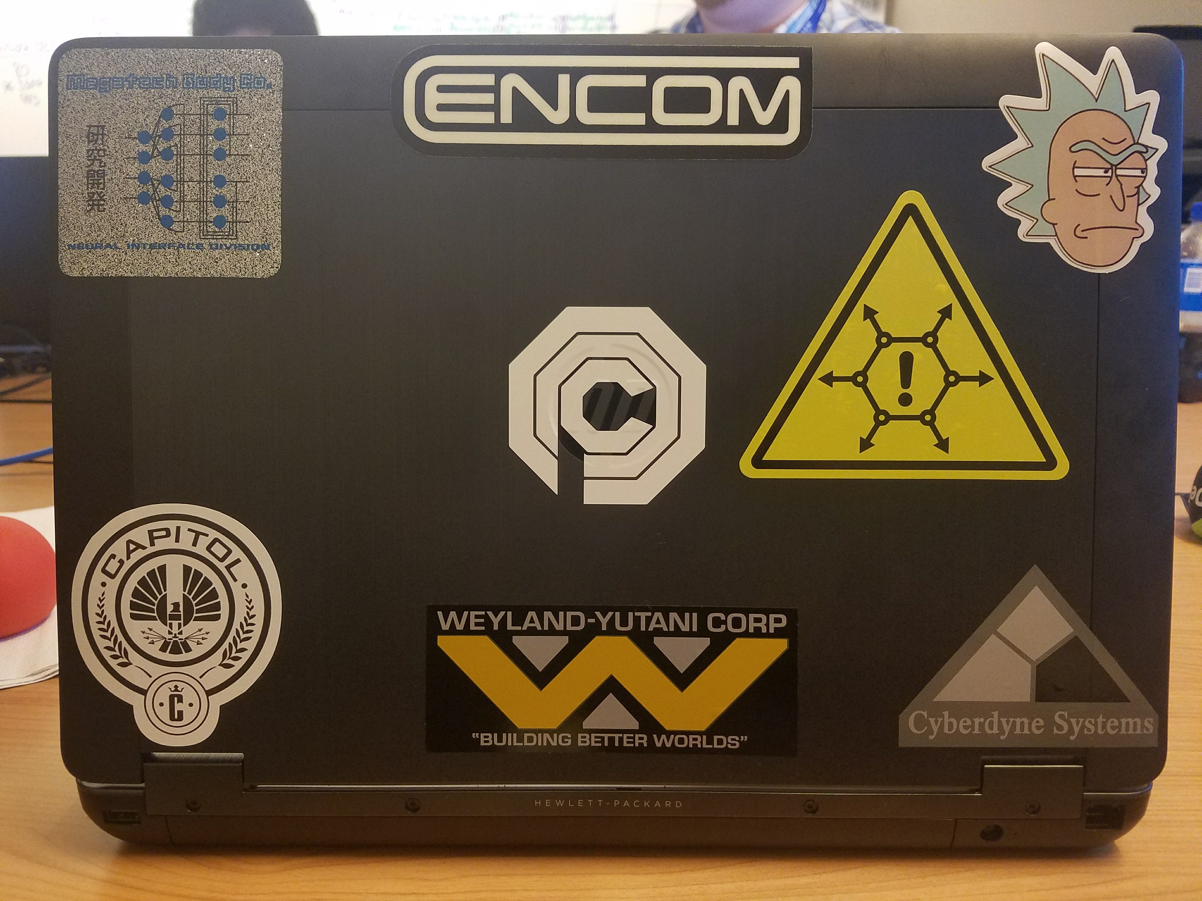 My old work laptop's stickers had a quirky theme...