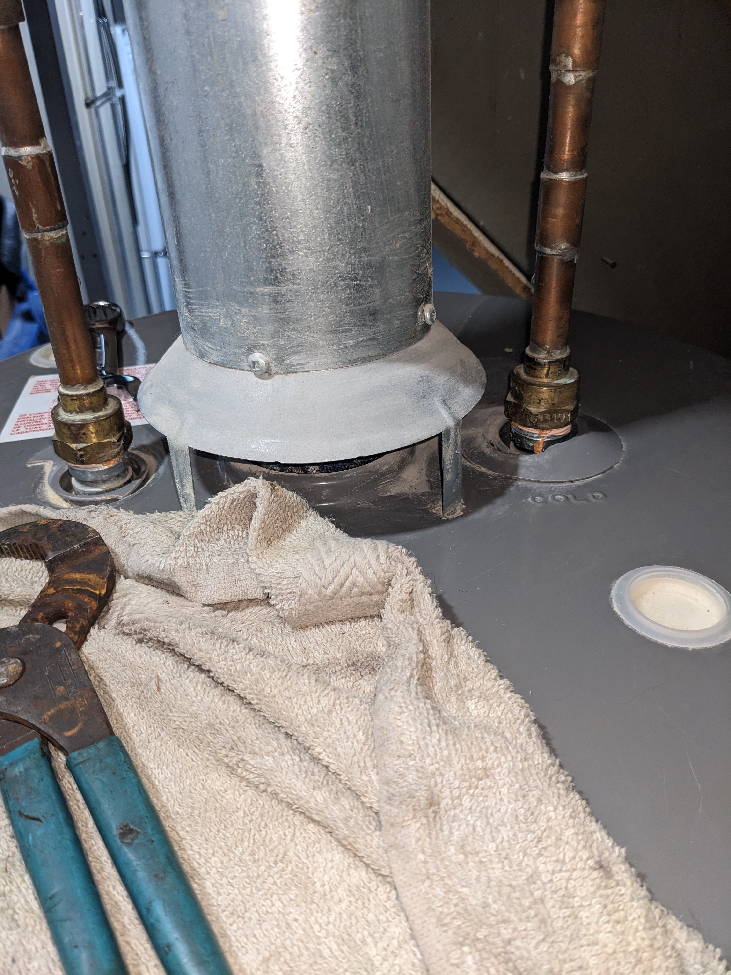 Step-by-step guide to removing copper pipes from your water tank.
