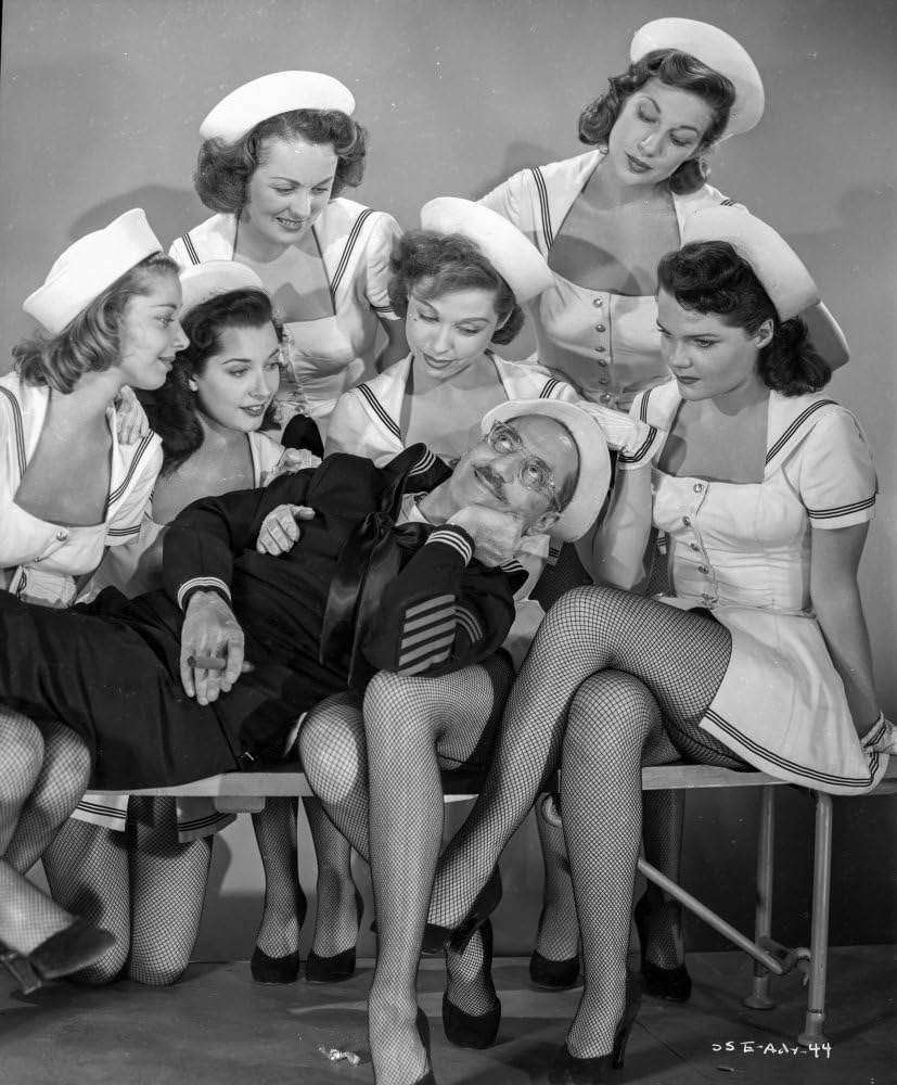 Promotional poster for 'A Girl in Every Port' (1952) featuring the iconic Groucho Marx.