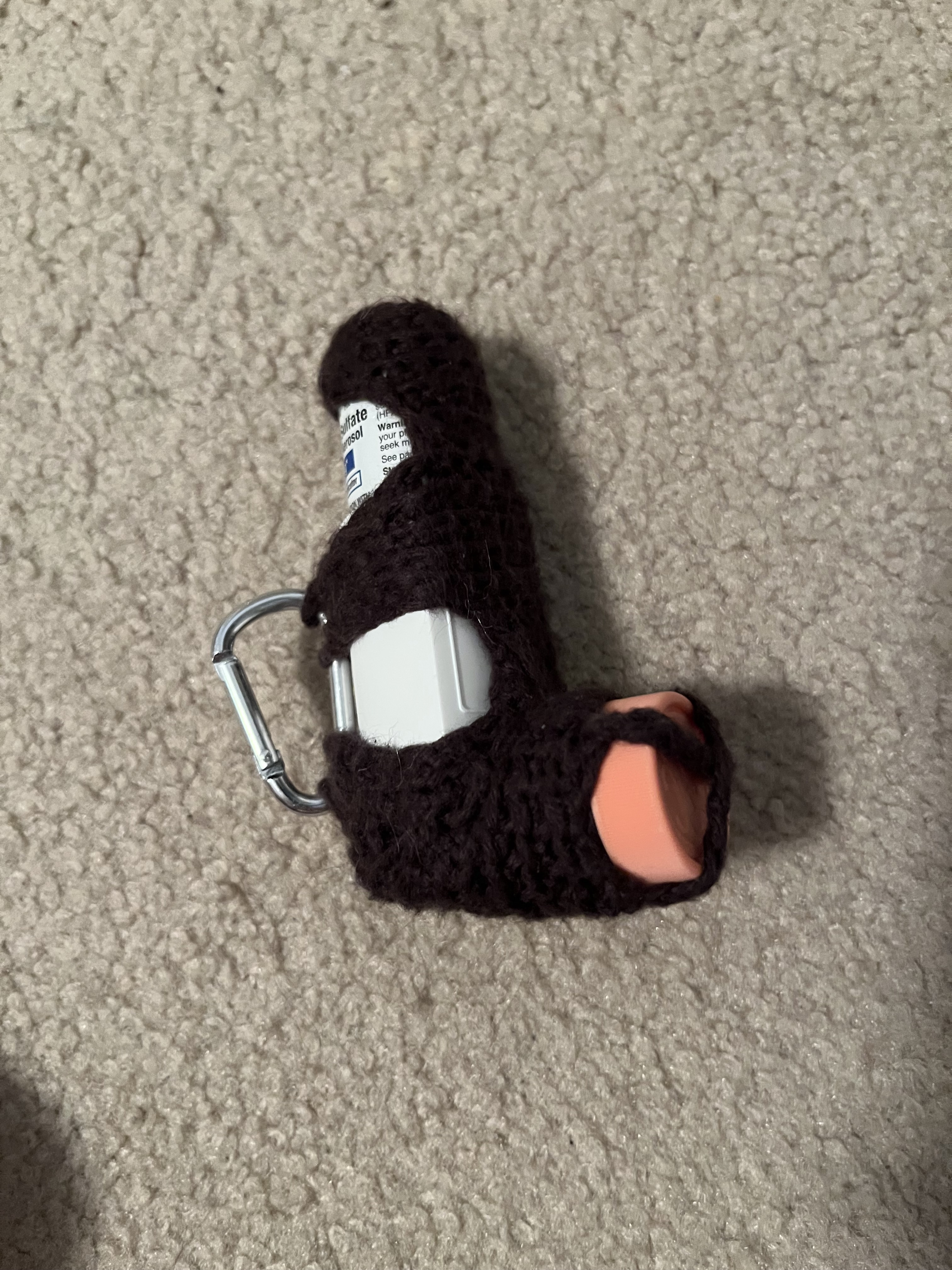 Crochet holders for both standard and hilariously oversized inhalers.