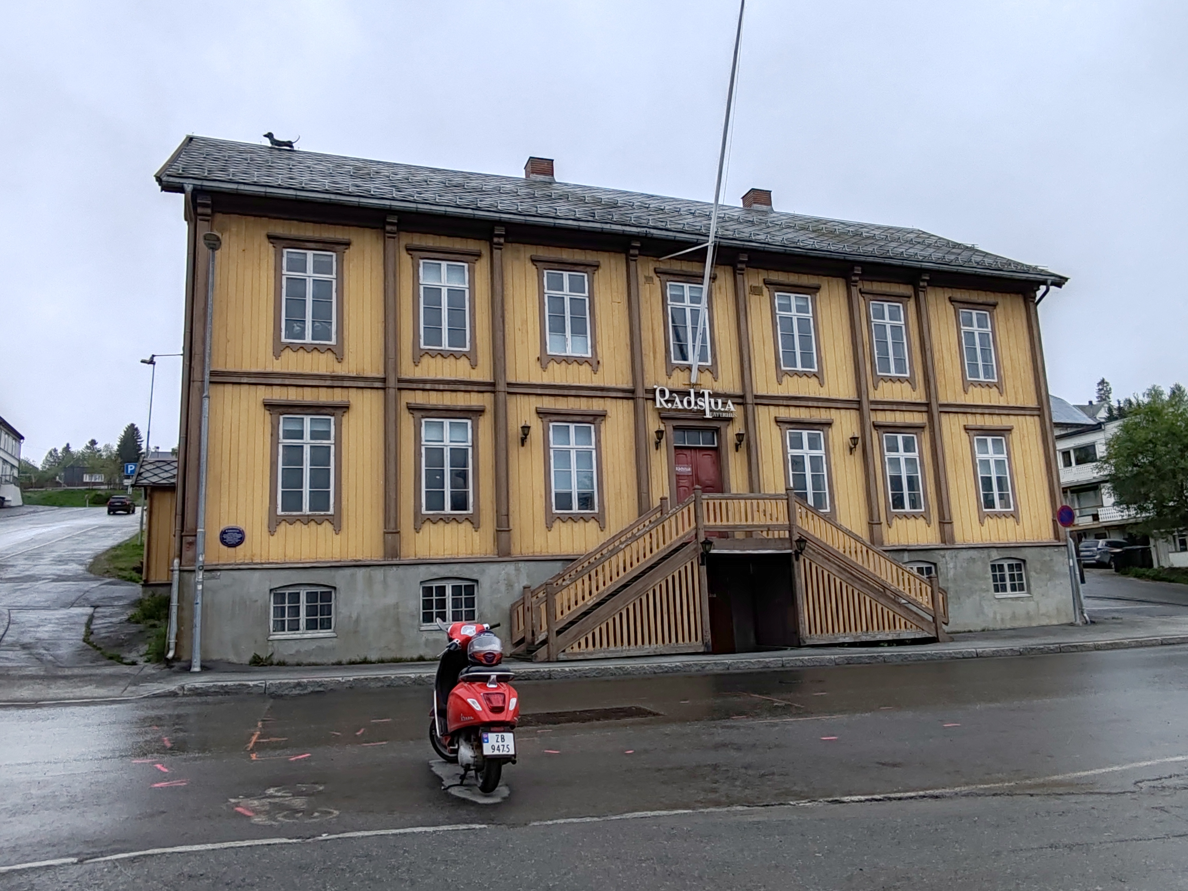A Charming Scene in Tromso, Norway: The Radstua Theatre with a Dog on the Roof
