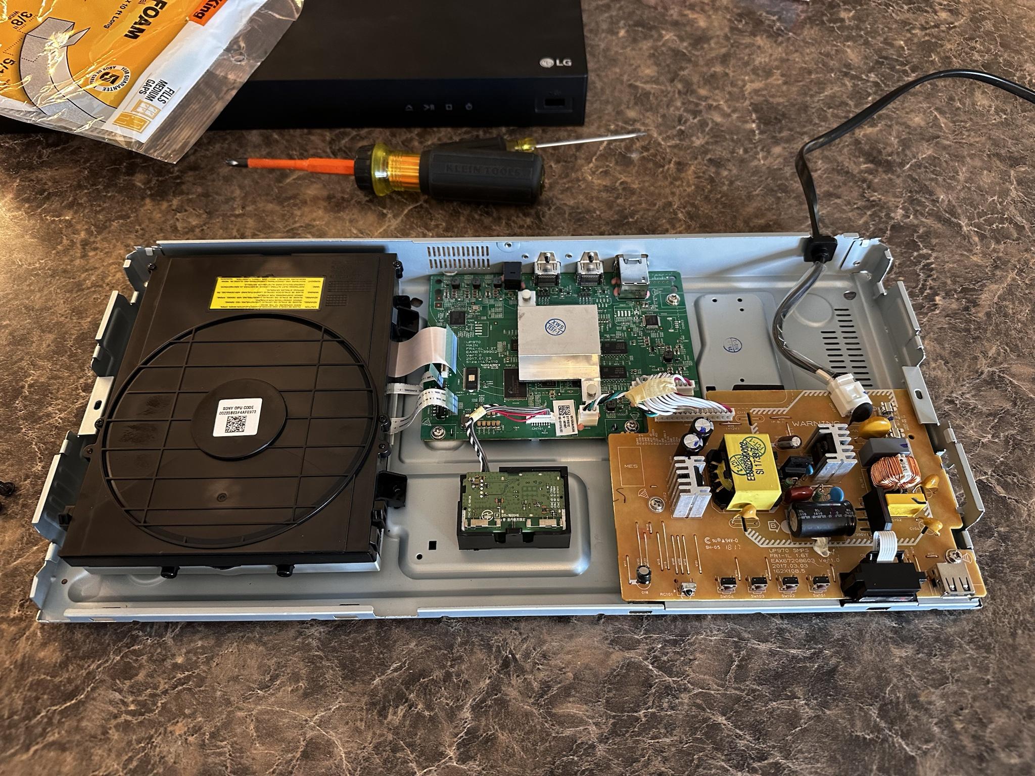 Unboxing the LG UBK90: A teardown of its noisy disc drive.