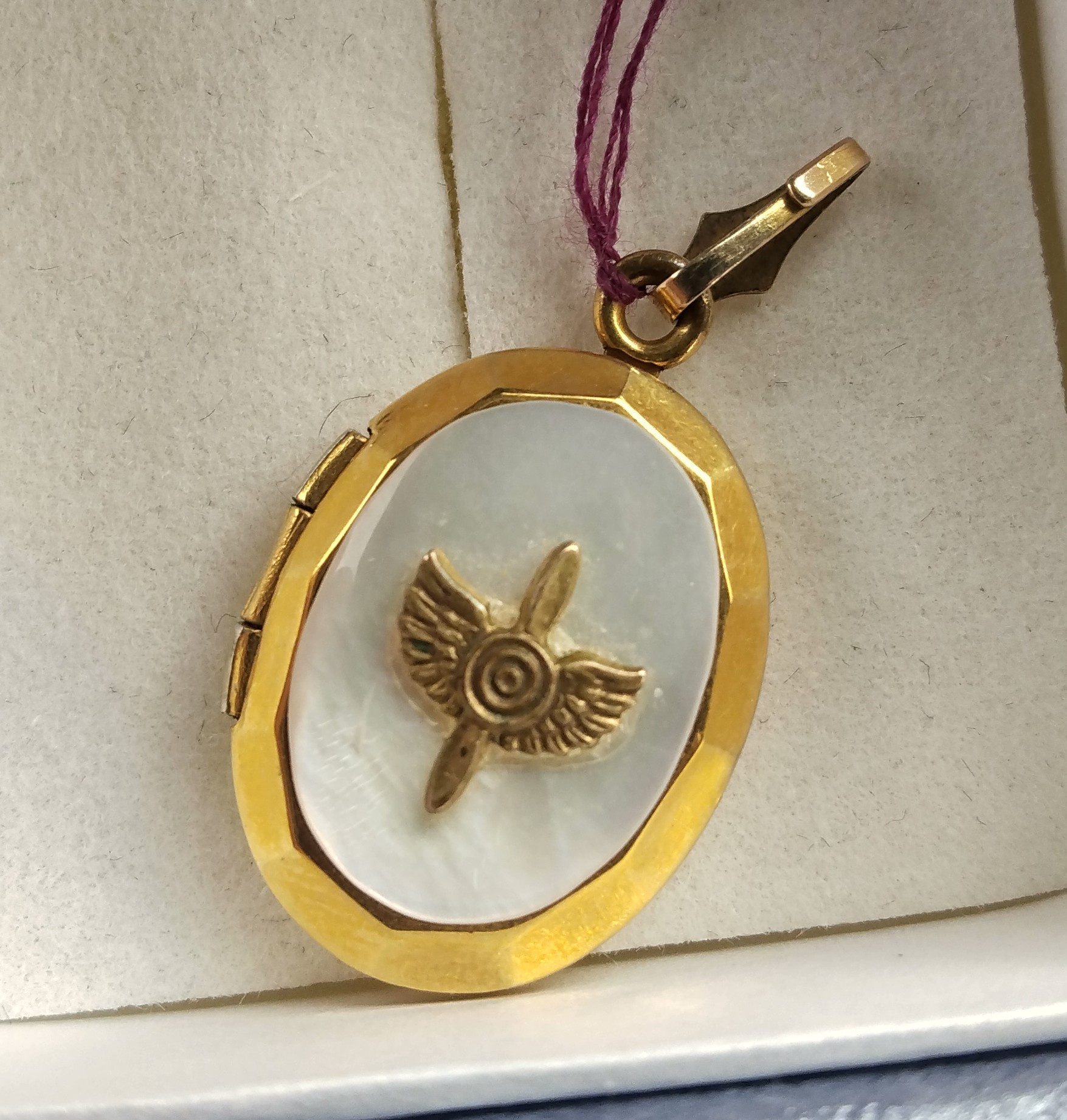 A Vintage WWII Pendant Discovered at a Yard Sale Today