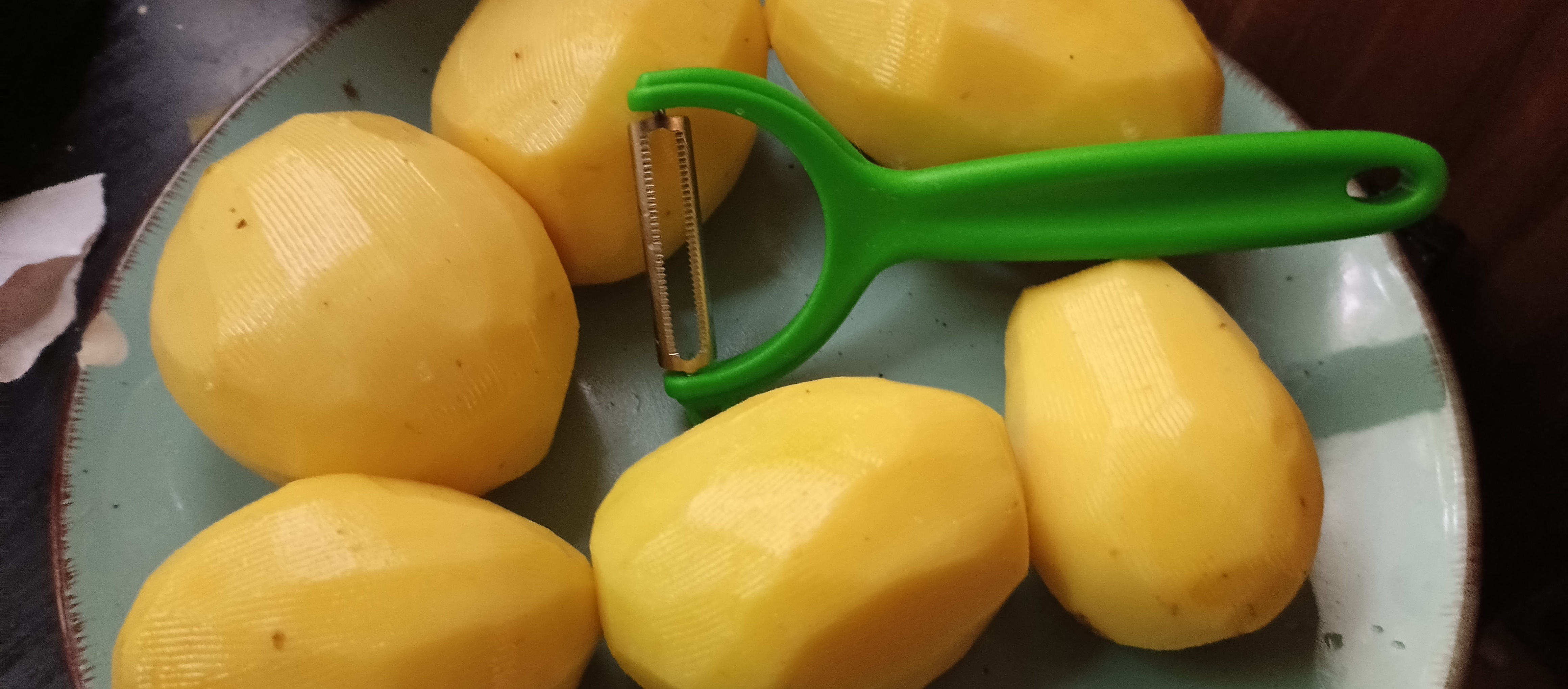 Just a Simple Chipped Plate with Peeled Potatoes: The Everyday Struggle