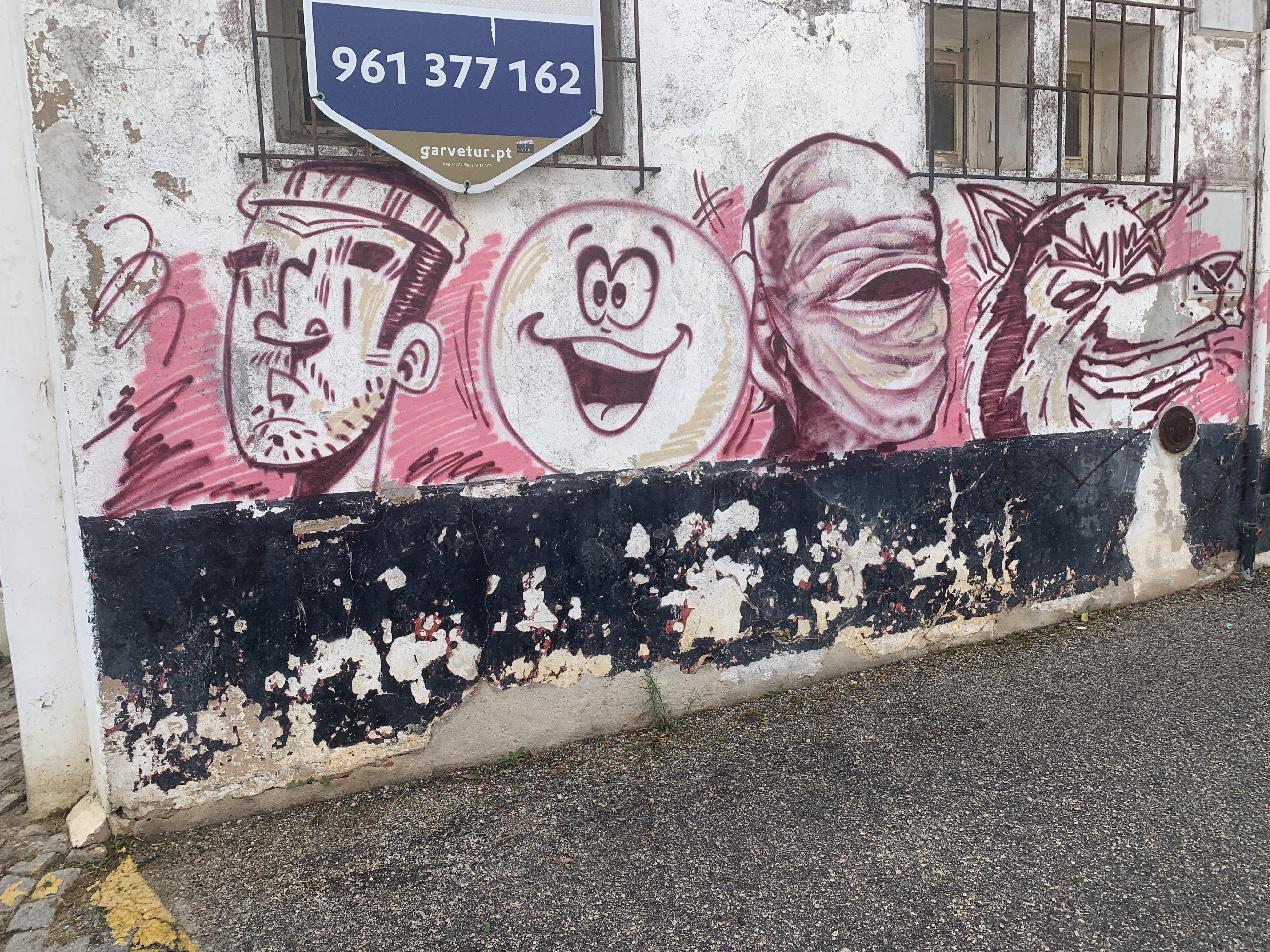 Faces of the vibrant street art scene in Lagos, Portugal.
