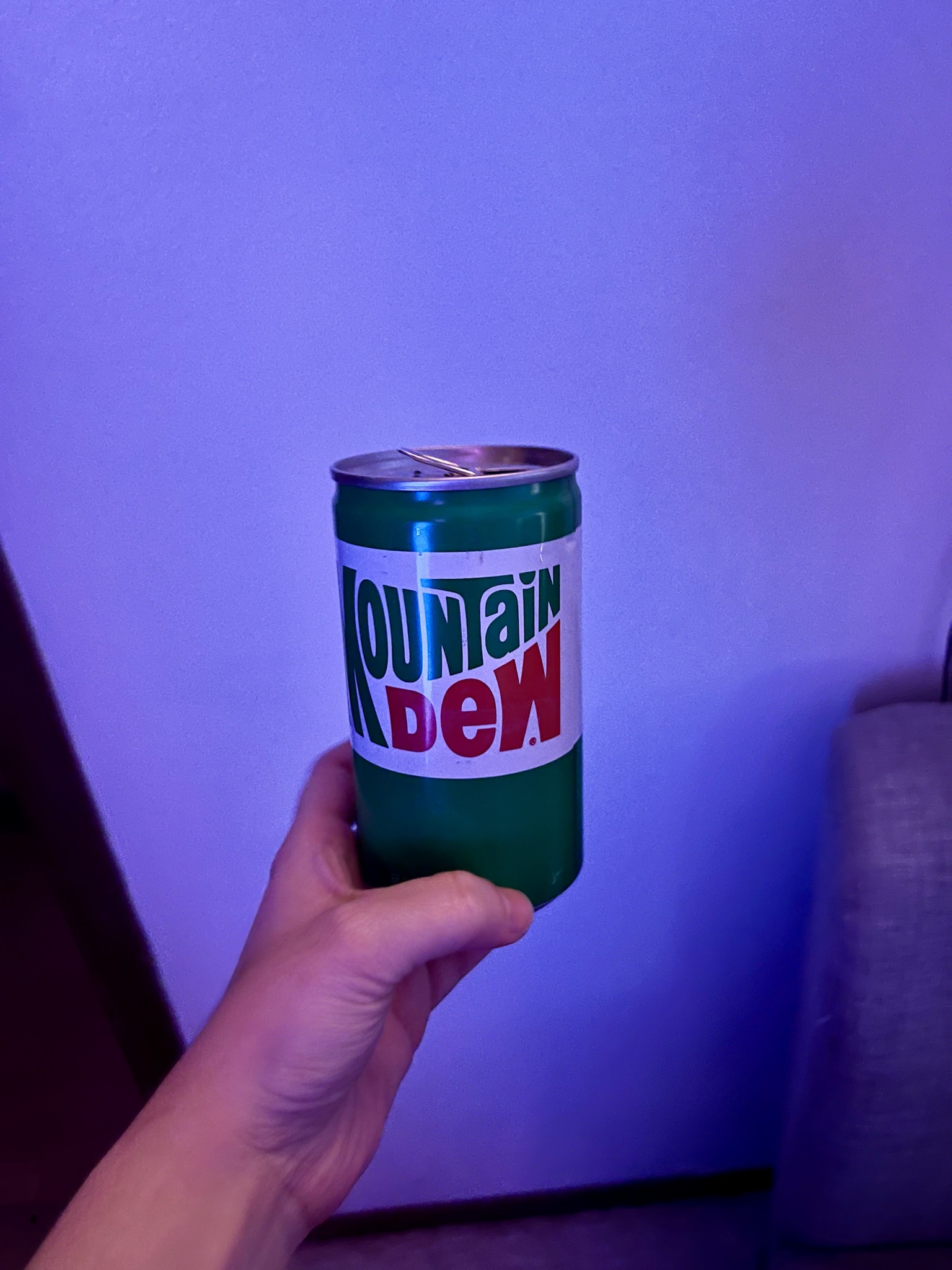 Discovering a Vintage Mountain Dew Can Hidden in the Bathroom Wall
