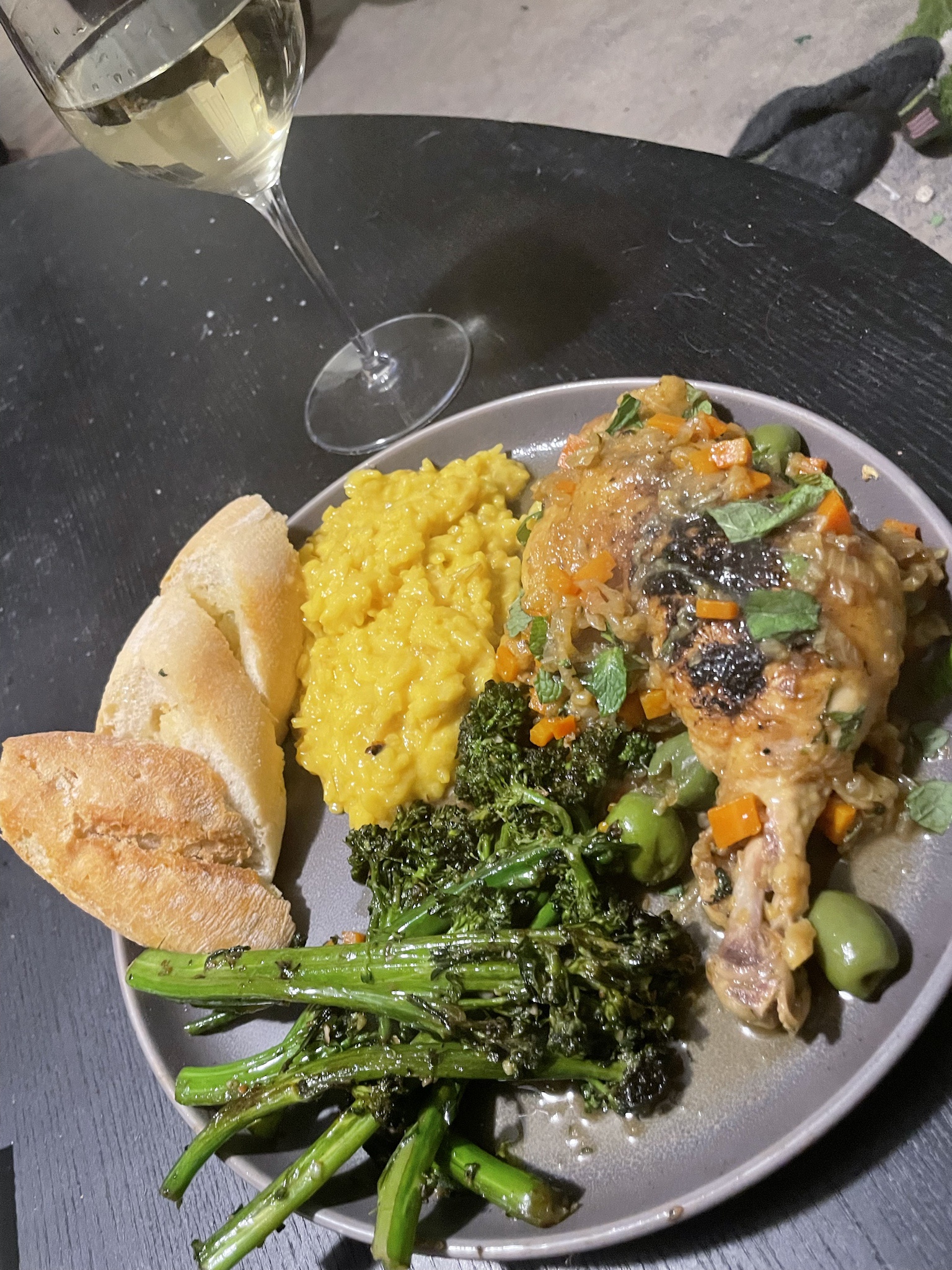 Savoring Chicken Quarters with Saffron, Olives, and Mint on a Bed of Risotto