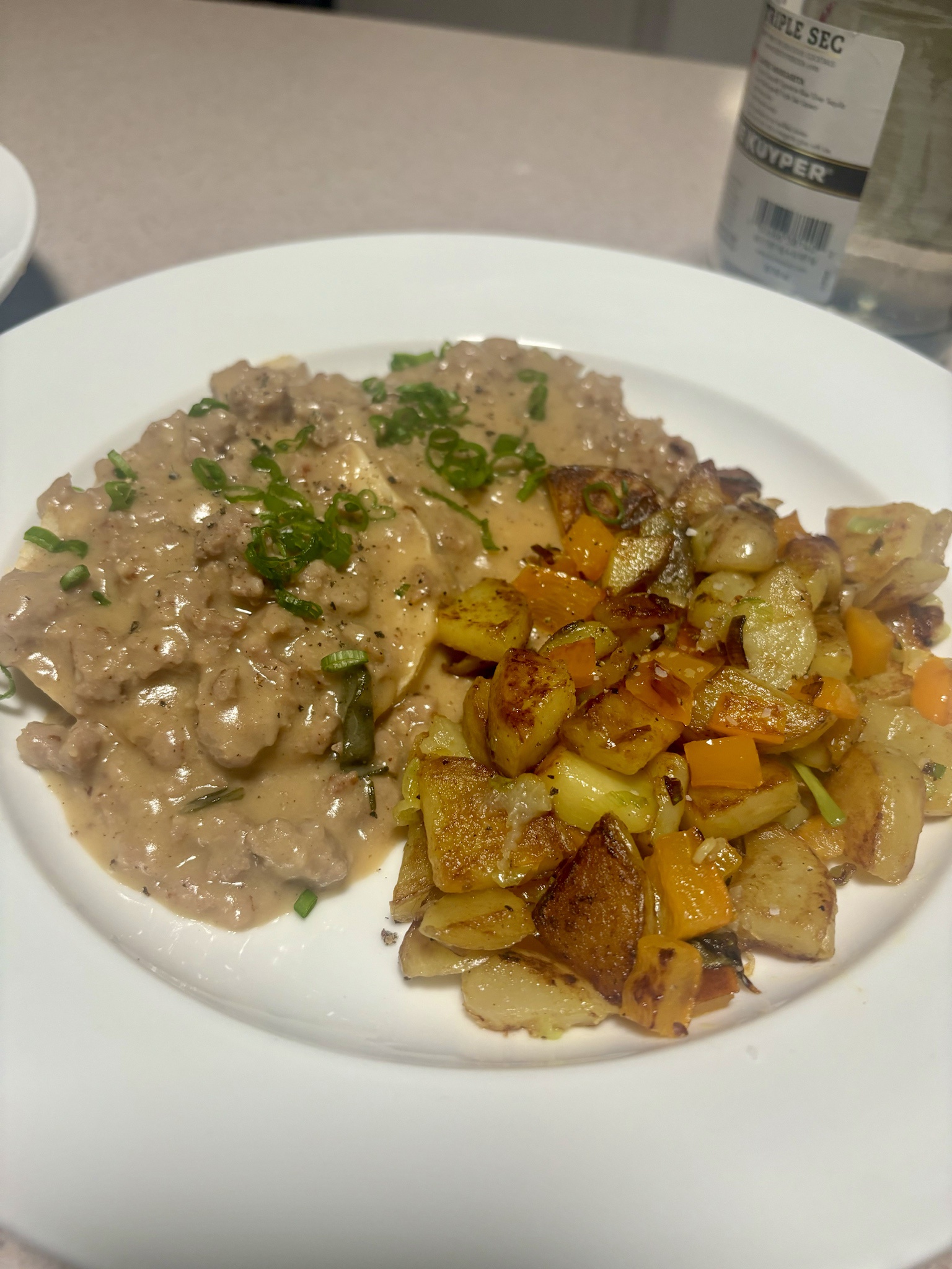 Last night's dinner: Biscuits, Gravy, and Breakfast Potatoes. Can you make comfort food look glamorous? I’m not sure!