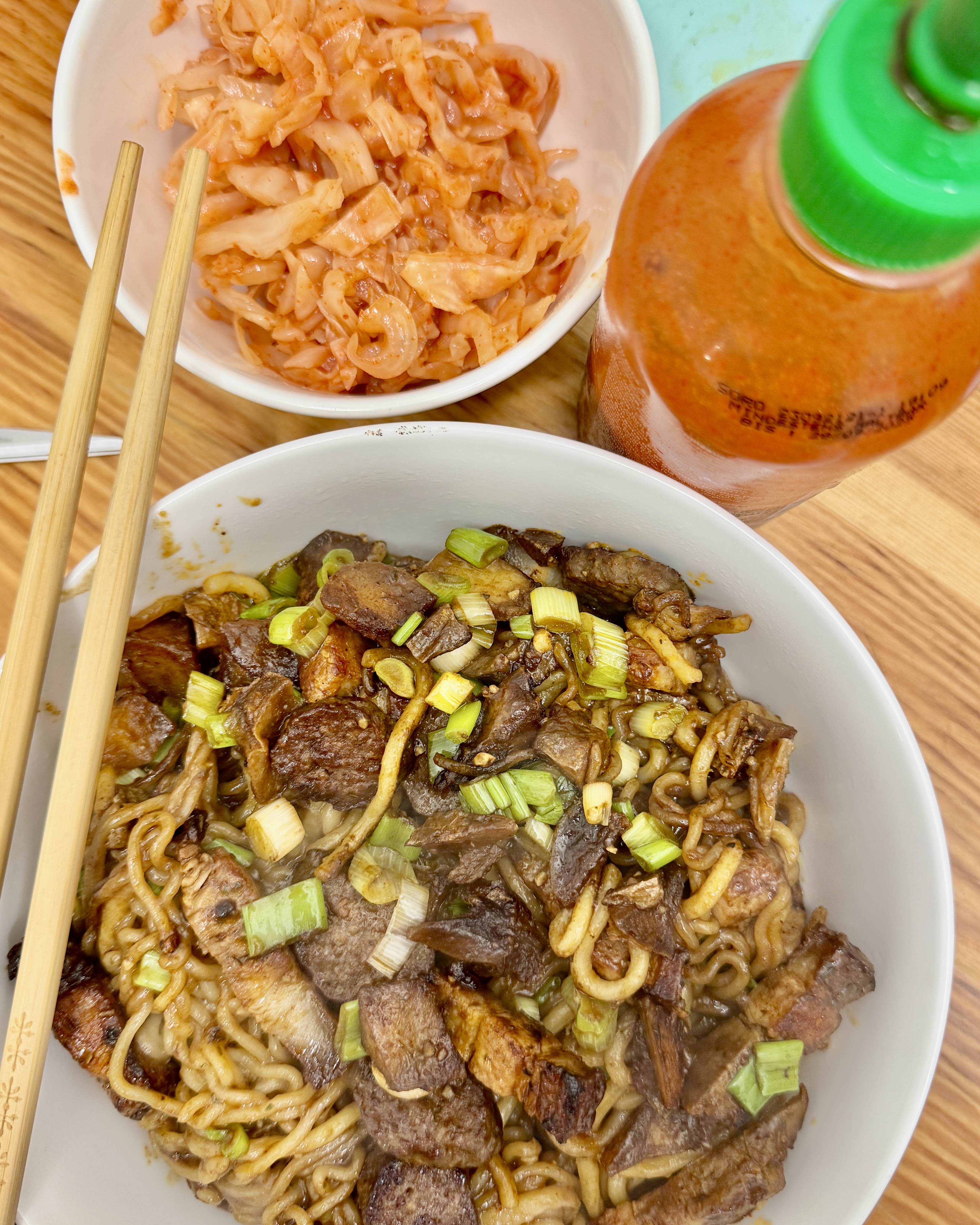 A Delicious Plate of Stir-Fried Noodles with Pork Belly and Kimchi