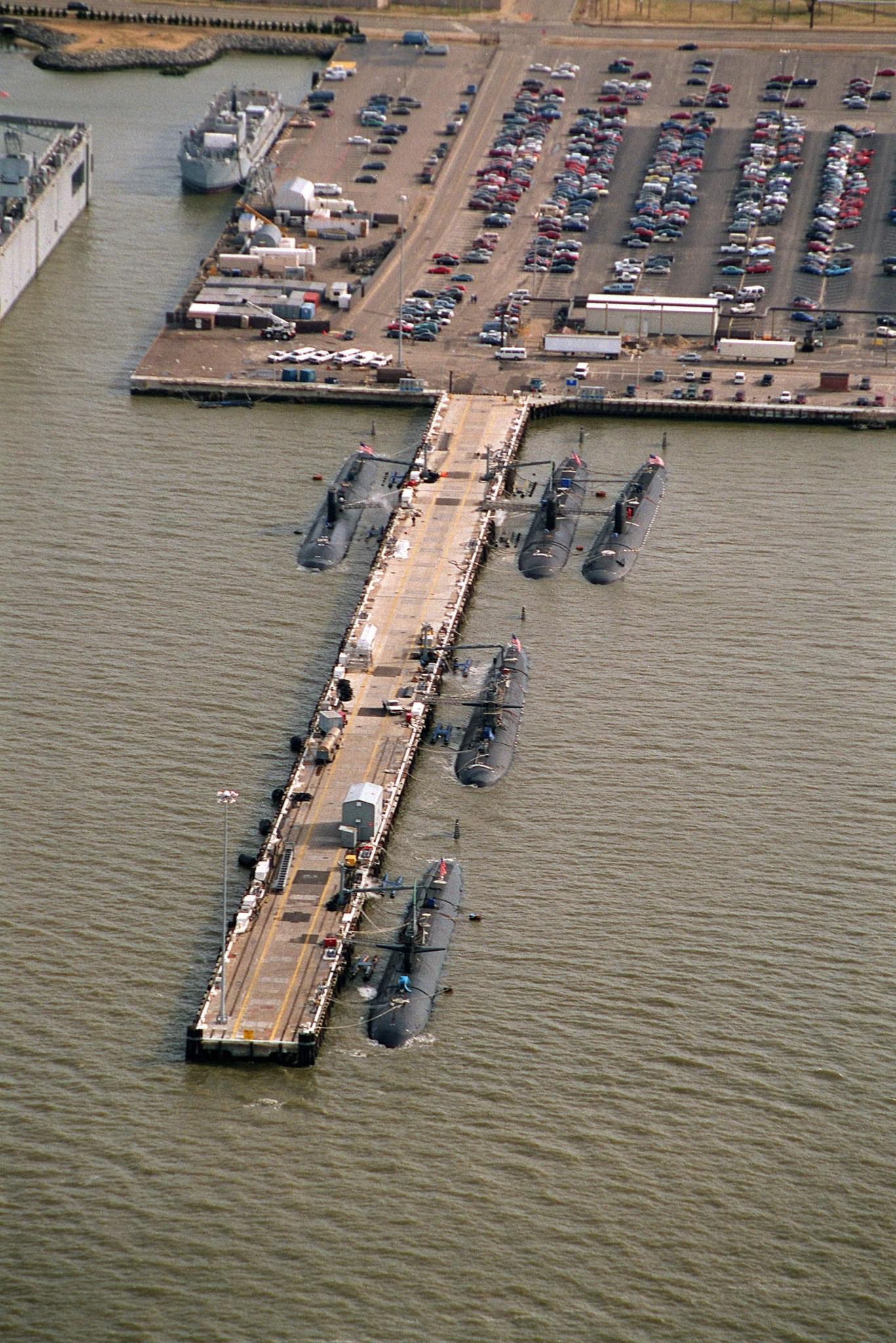 A fleet of five Los Angeles-class nuclear submarines docked at Norfolk's D&S pier