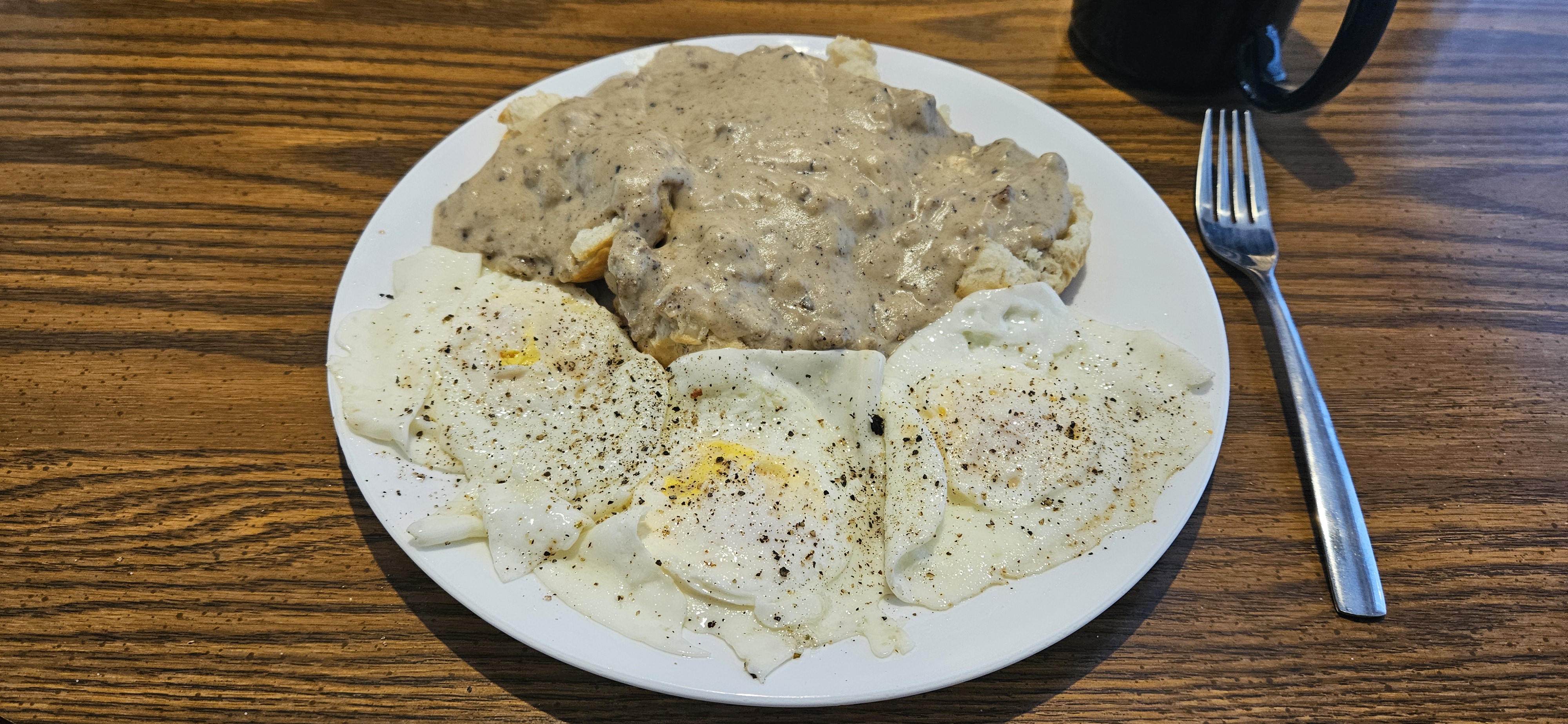 This Sunday’s omelet features sausage biscuits and gravy with eggs!