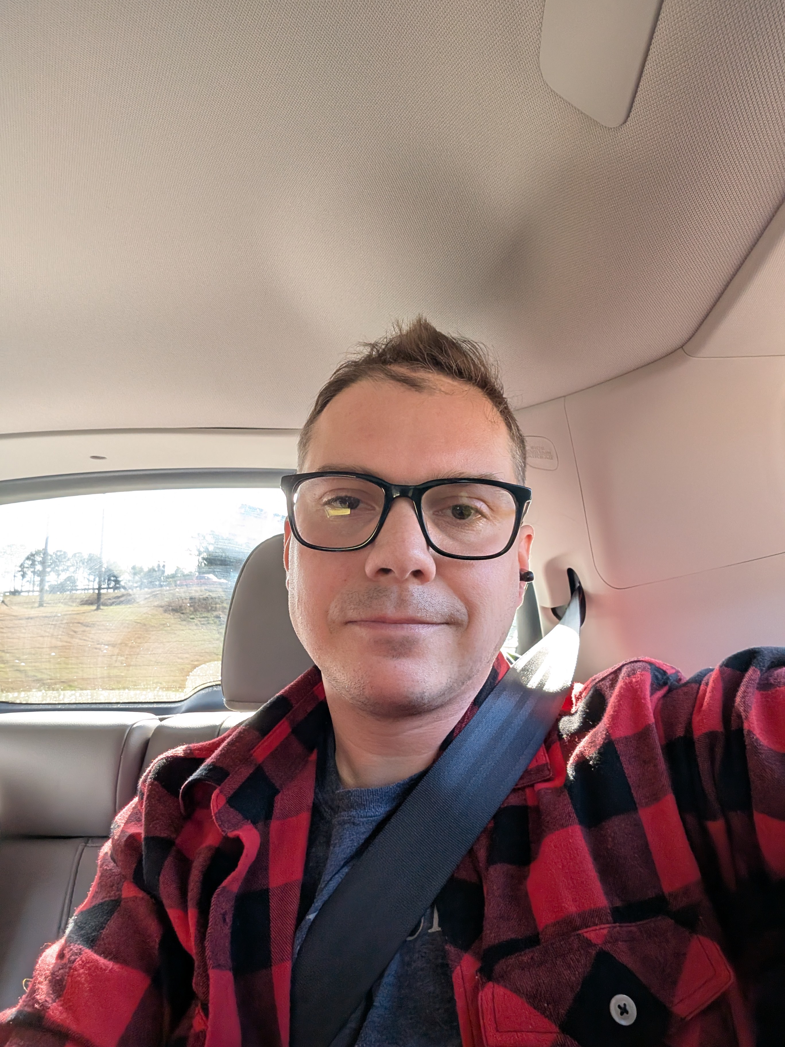 Merry Christmas from the Cozy Backseat of Our Family Car!