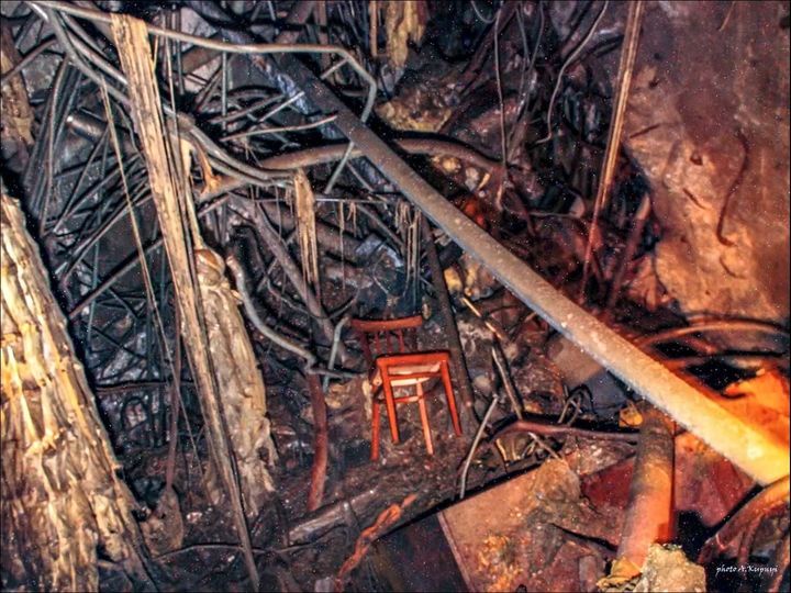 A wooden chair precariously perched atop Chernobyl's reactor