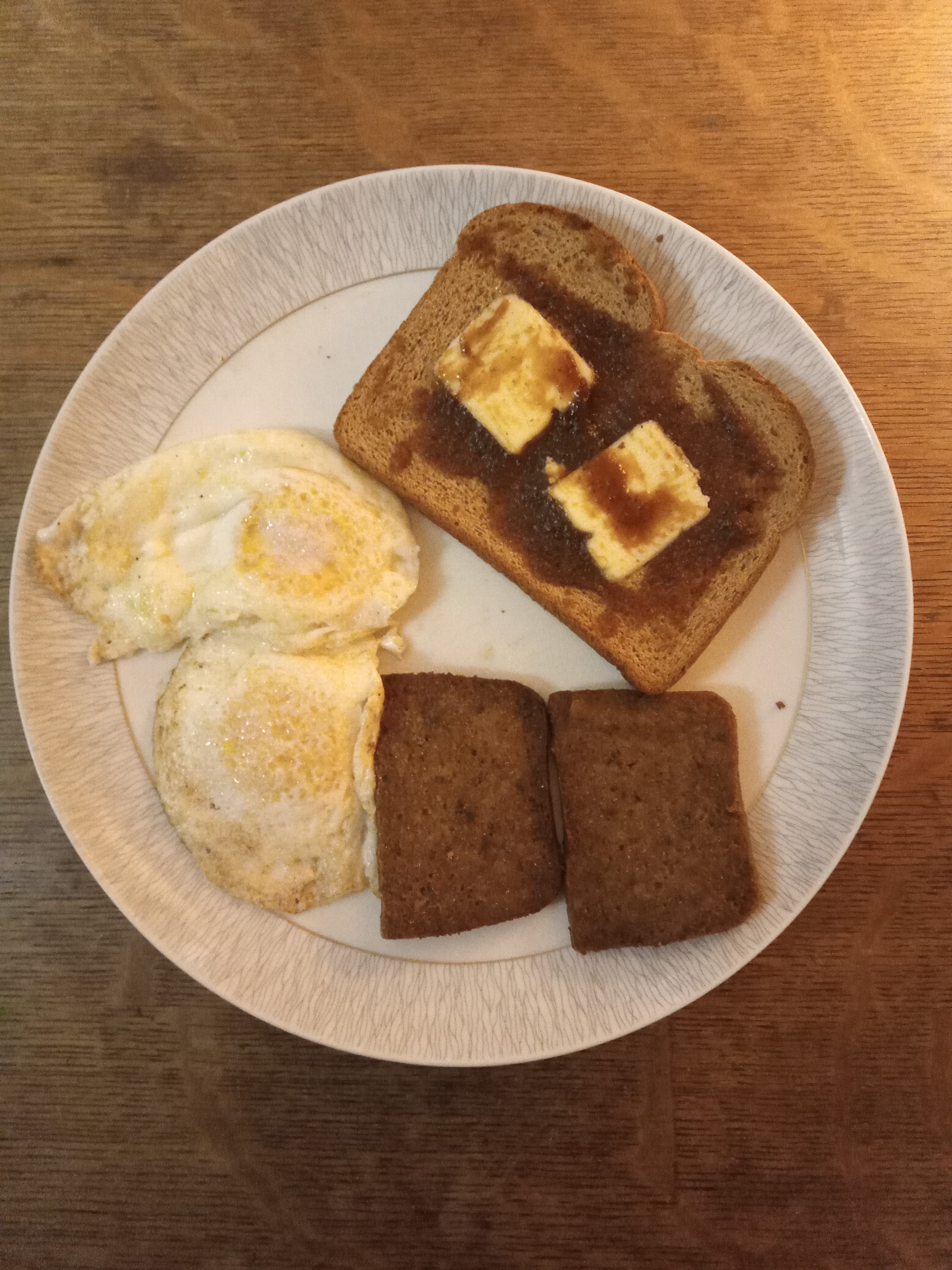 Indulging in dippy eggs, scrapple, and toast slathered in apple butter!