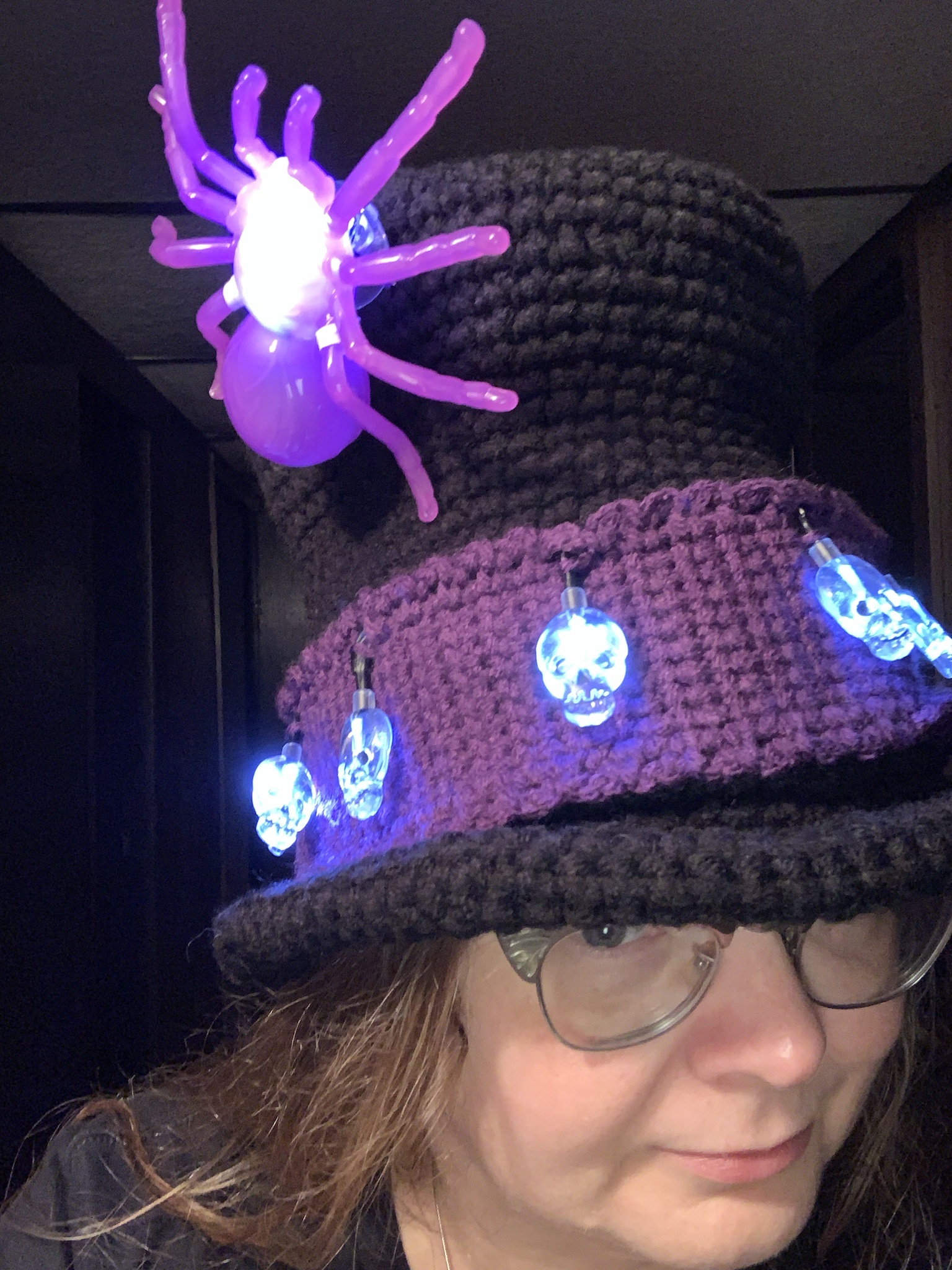 Rocking the Halloween hat like a pro!