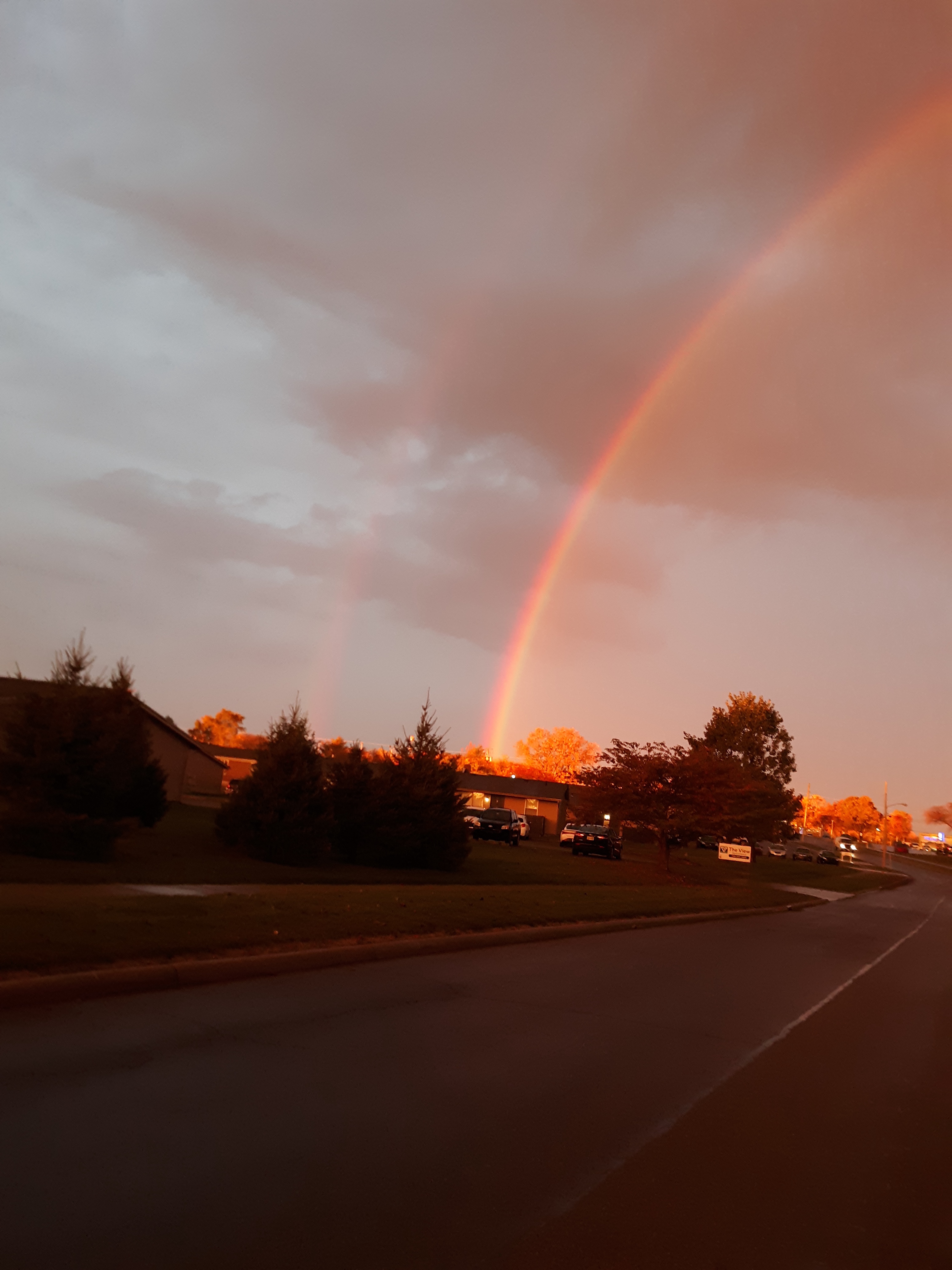 Witnessing a Double Rainbow: Nature's Colorful Surprise
