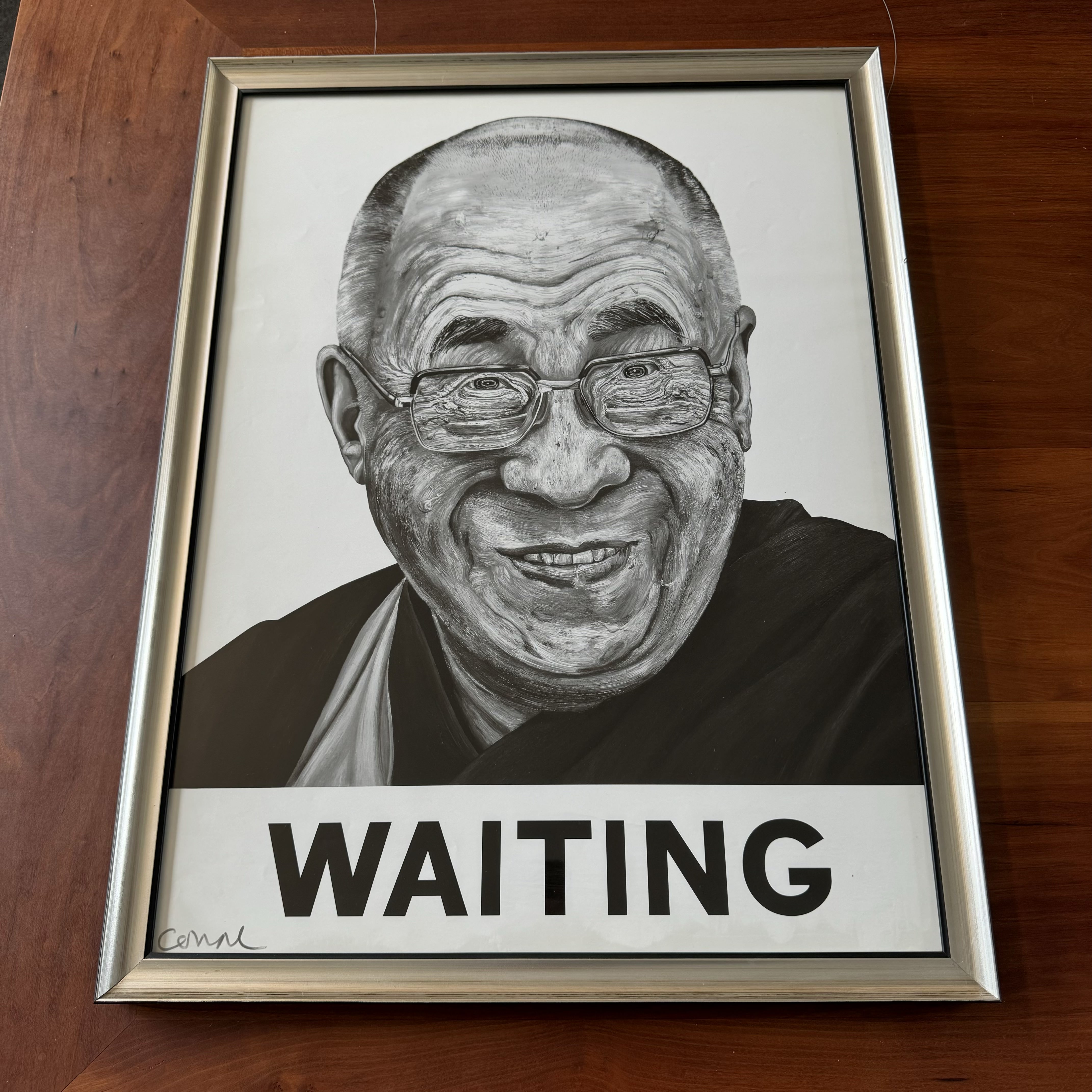 Framed Masterpiece: Robbie Conal's Dalai Lama Waiting