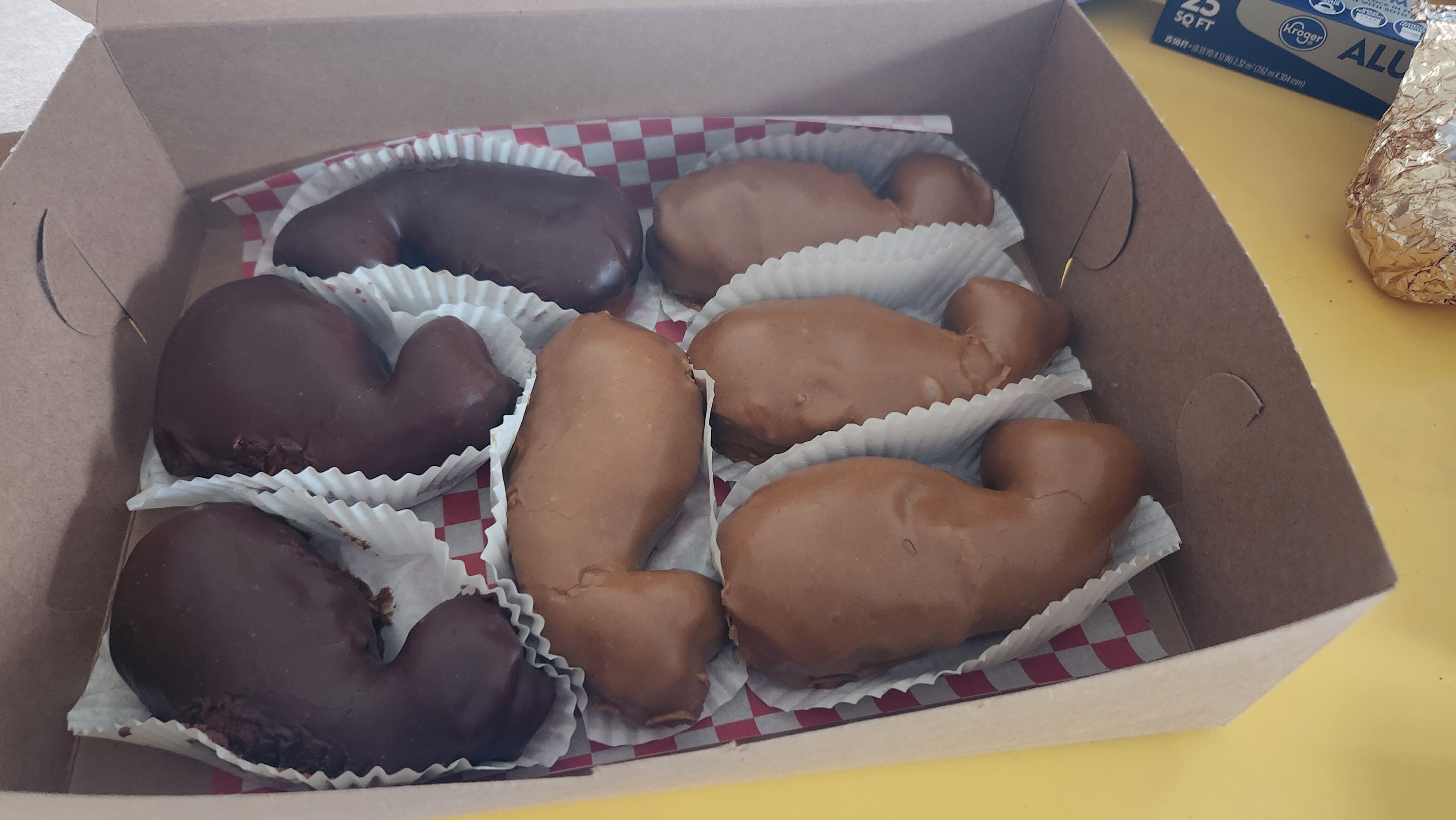Surprising my coworkers with delightful whale donuts, each wrapped with a personal note!