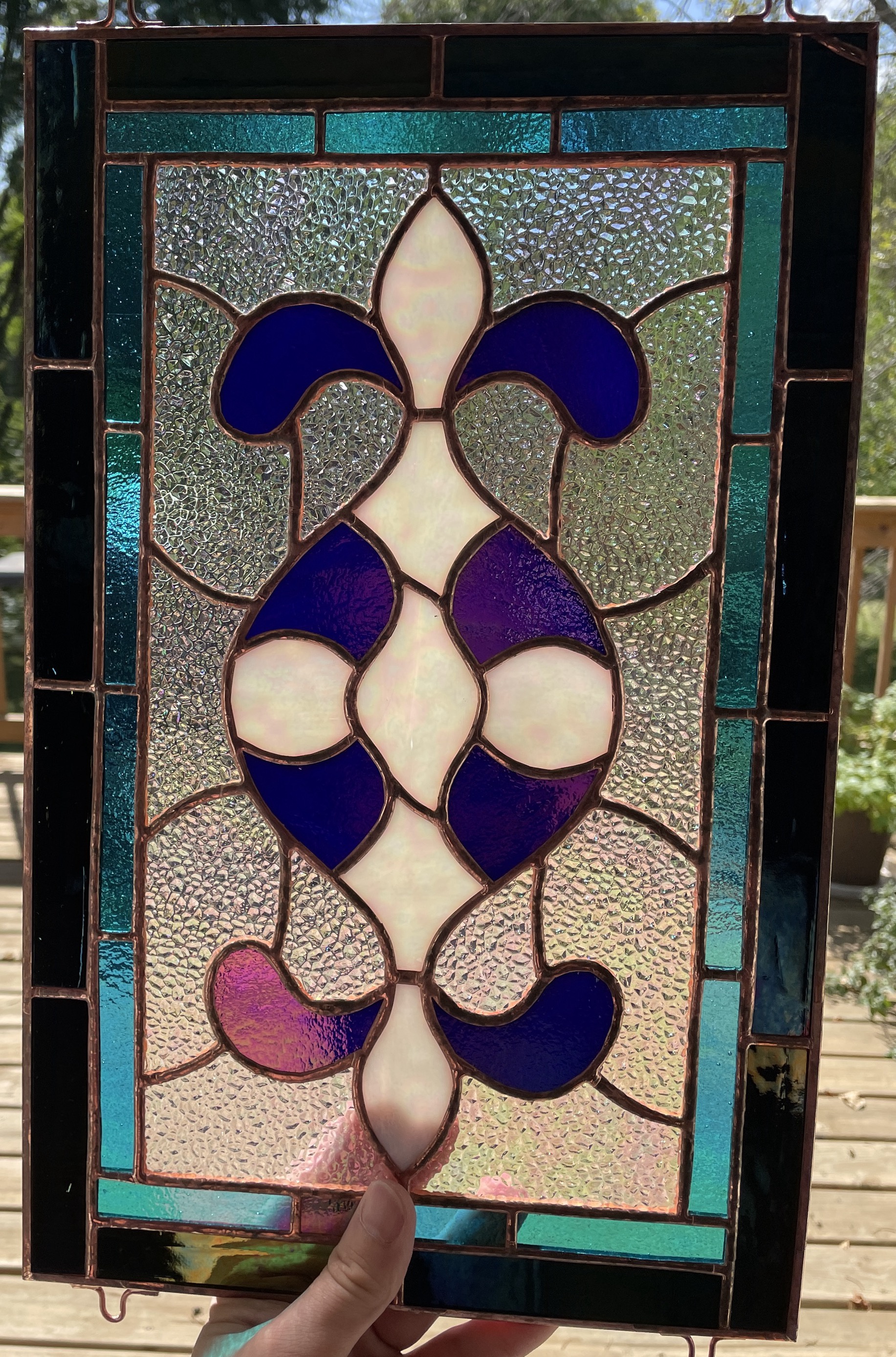 Is This a Beautiful Traditional Stained Glass Piece or Something Else?
