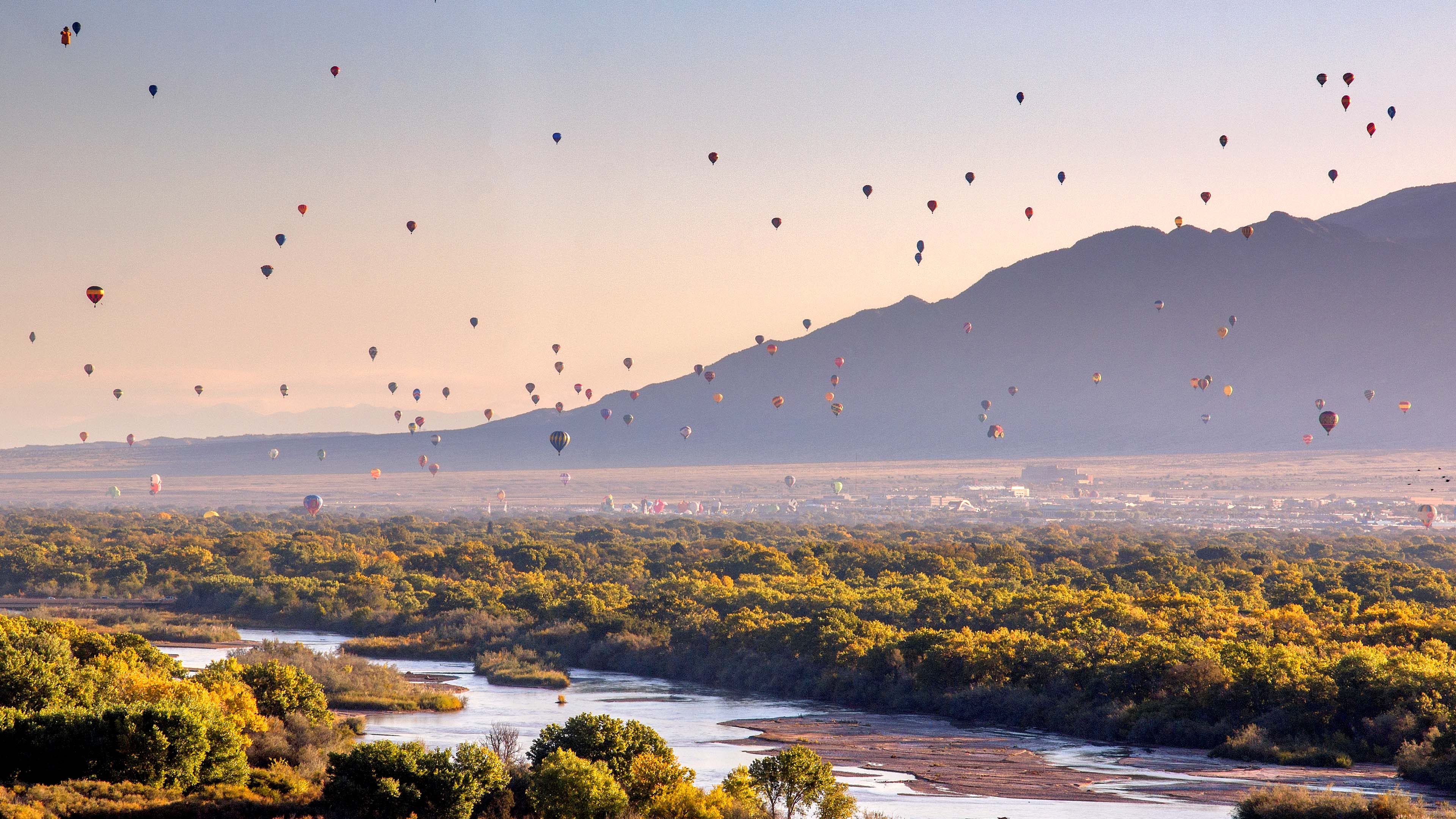 Hot air balloons soaring over the high desert.