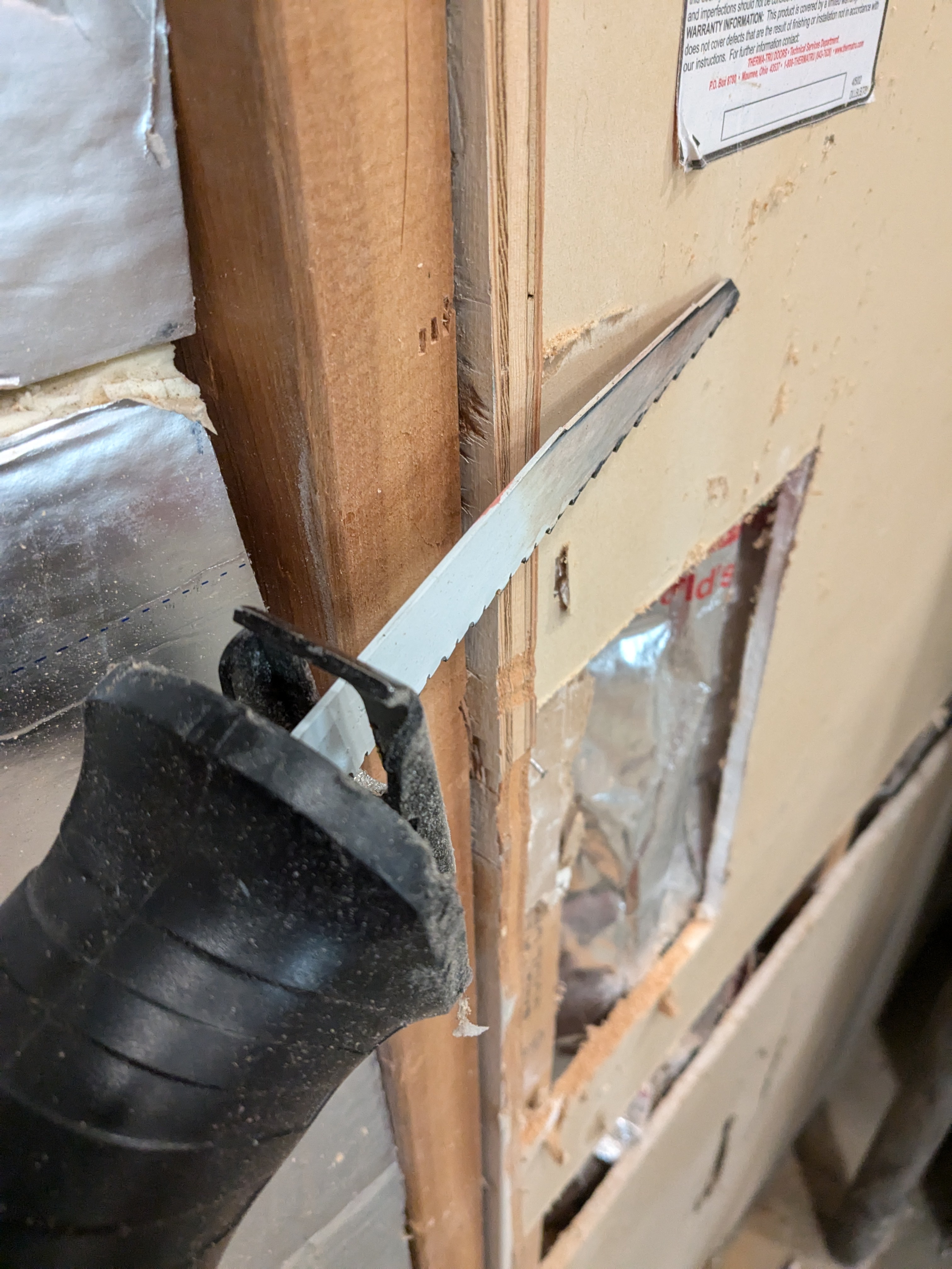 Carefully Trimming That Protruding Plywood
